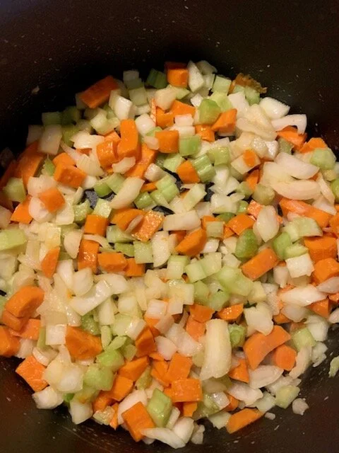 Vegetables in the pot ready to soften