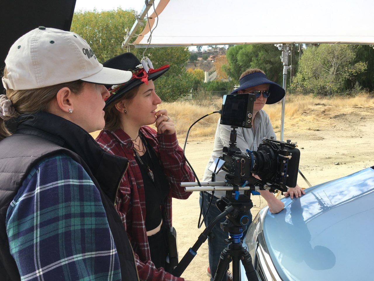 Director Kate Ketcham, Cinematographer Kyah Cook, and Producer Cameron A. Mitchell on set.