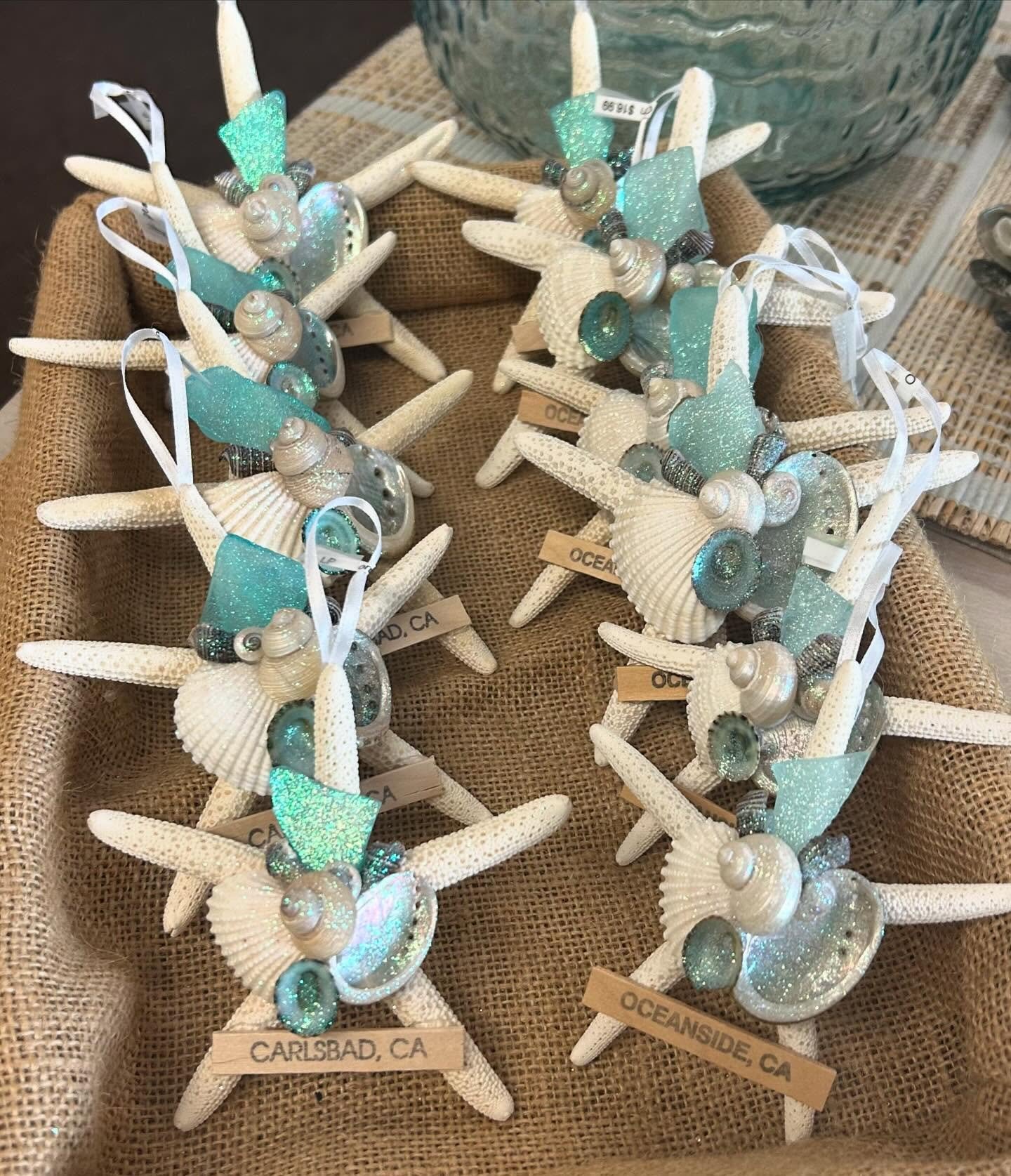 Back again this year&hellip;our best selling Carlsbad &amp; Oceanside starfish ornaments embellished with shells and seaglass. Perfect stocking stuffers!
#seasideholiday #handmadeornaments #carlsbad #oceanside #carlsbadvillage #oceantideinteriors