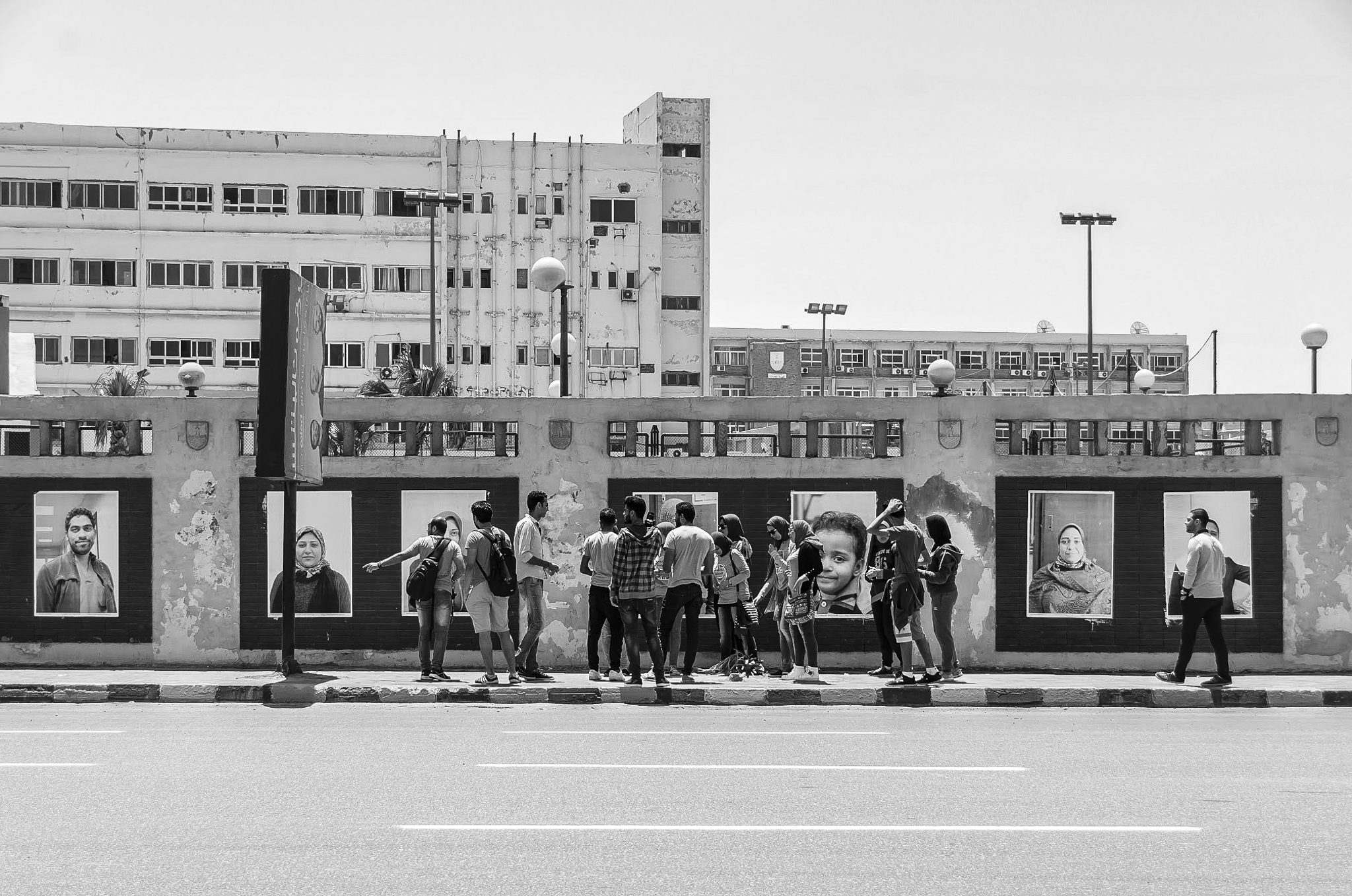 The photo then becomes a person and becomes an identity...A conceptual use of a photo creates a dialogue between the passerby and the portraits.