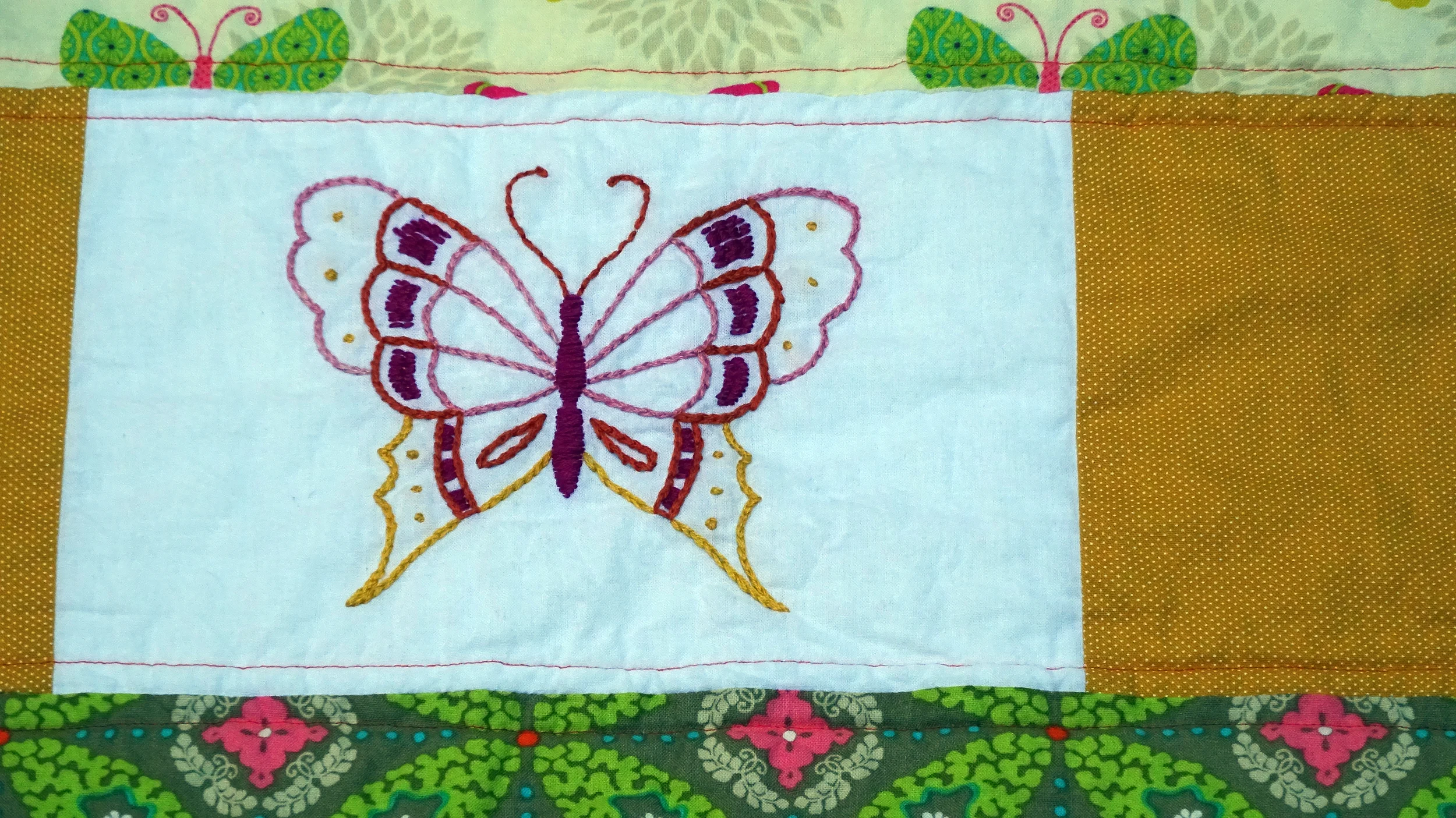 Wrapper Butterfly Embroidery Close up 36in by 56 in.jpg