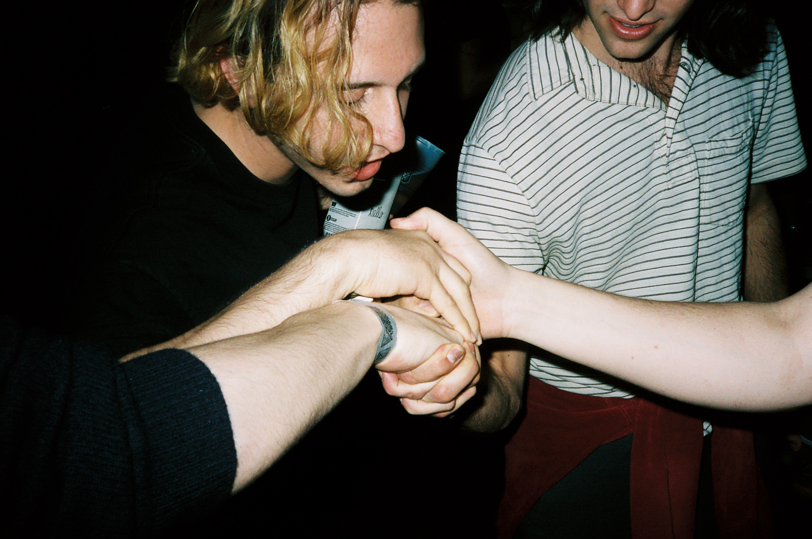 A “bring it in” before Beach Fossils go on at Do-Division