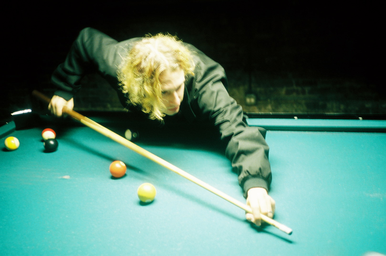 Dustin shooting an average game of pool pre-show