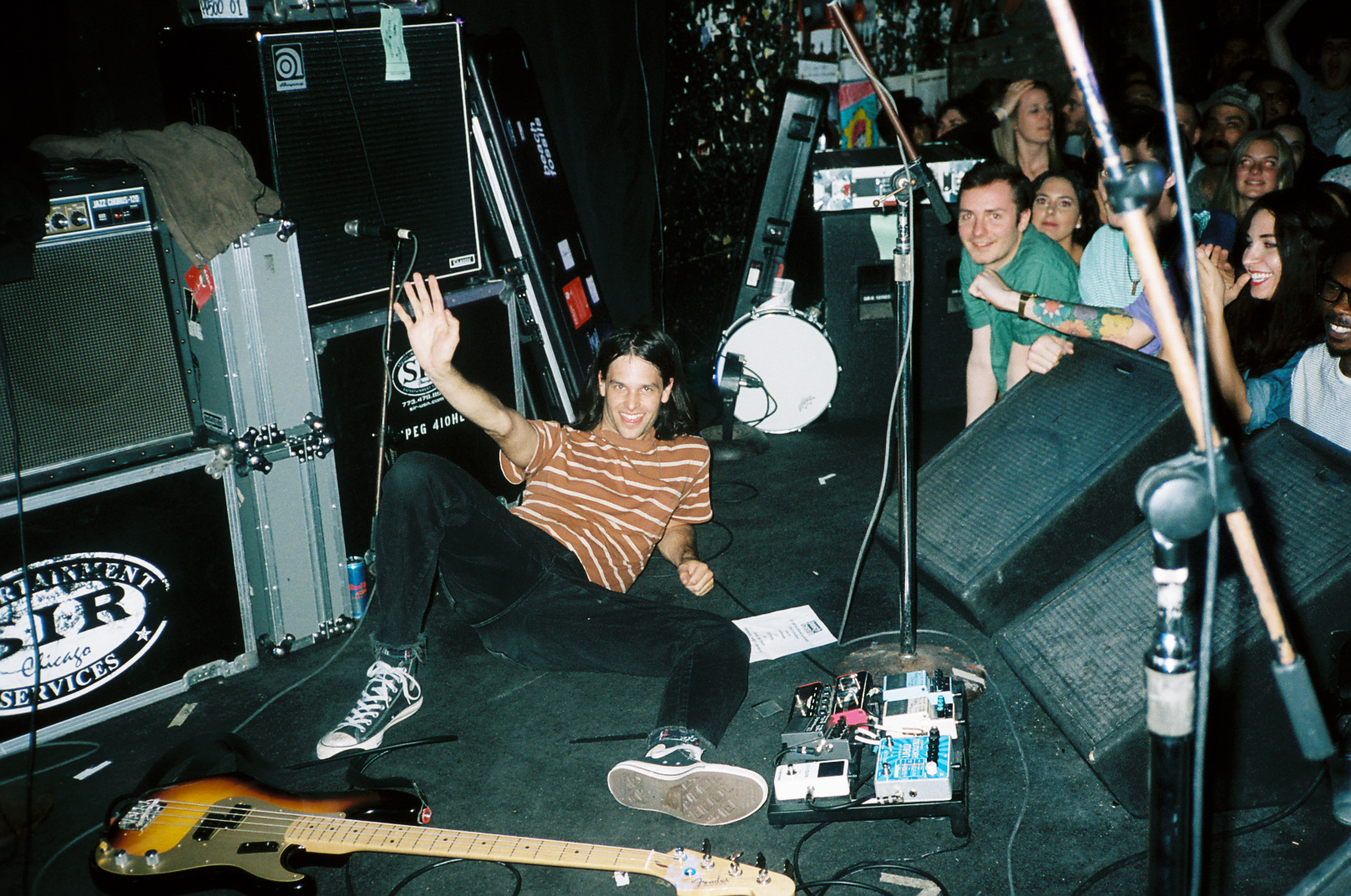 Jack hiding on the ground as the band “leaves” for their encore set