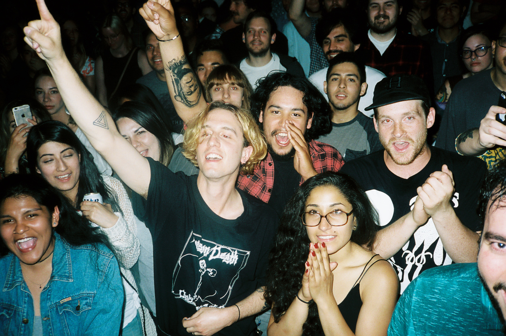 Dustin joins the crowd and cheers for a Beach Fossils encore