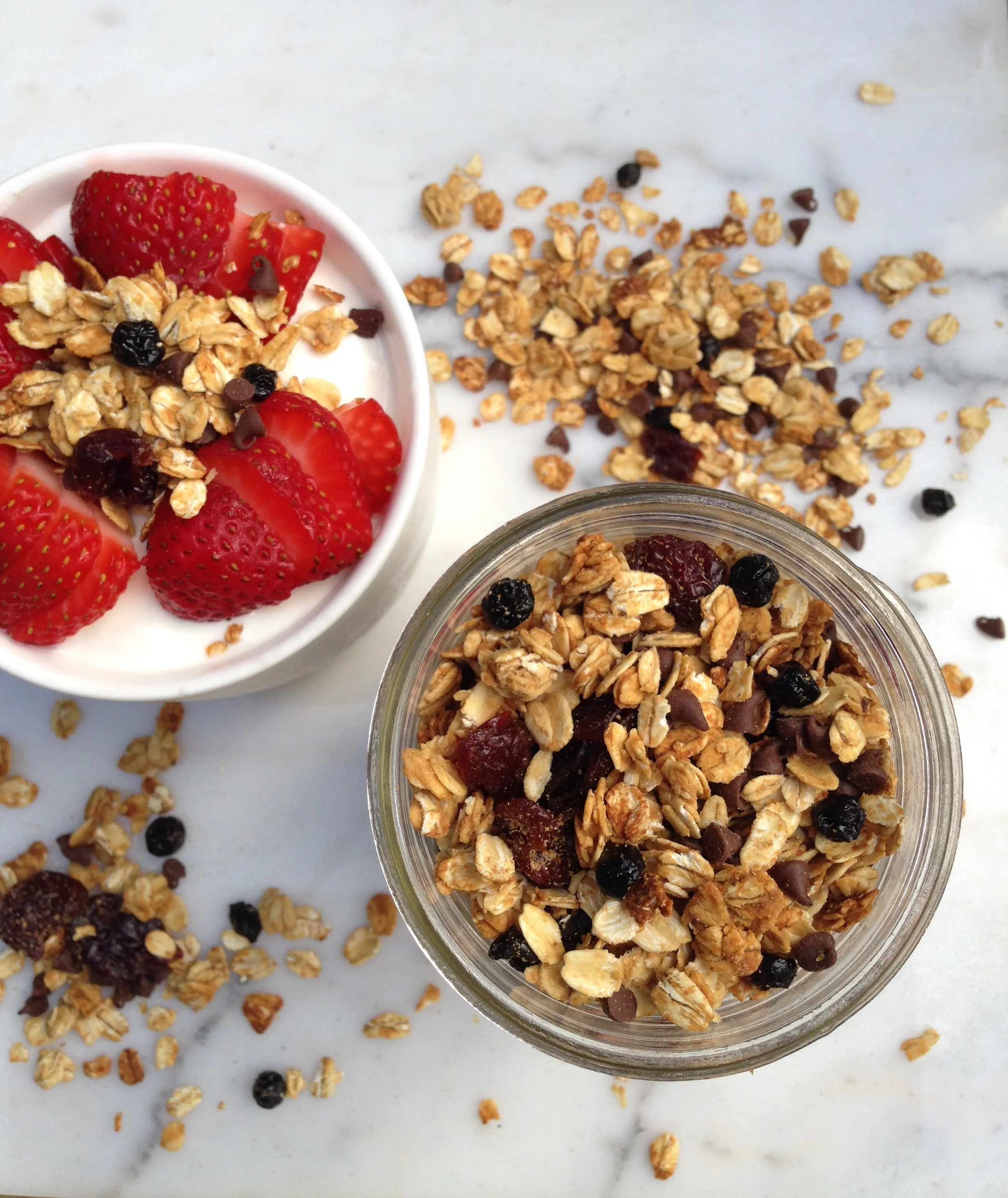 Homemade gluten free granola with blueberries, cherries, and chocolate 