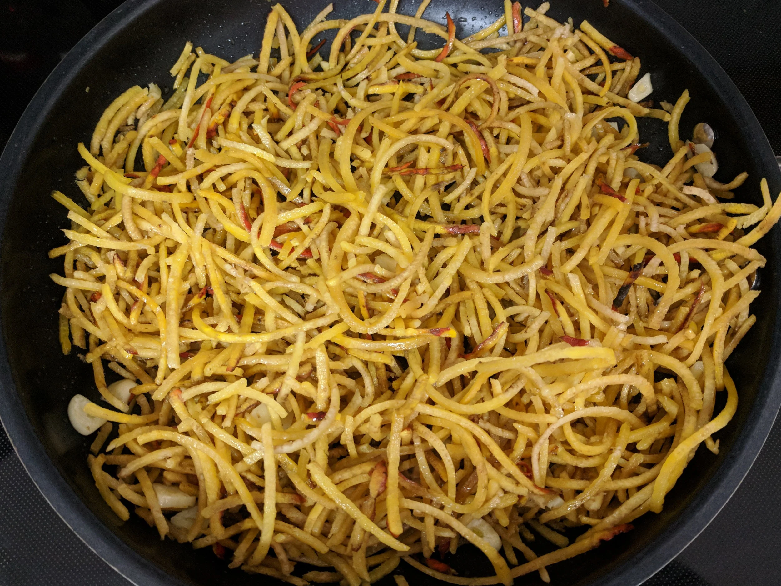 Add the golden beet spirals to the skillet coating with the olive oil. Another great benefit to the golden beet spirals is they cook in minutes making it simple to prepare a meal in under 10 minutes.