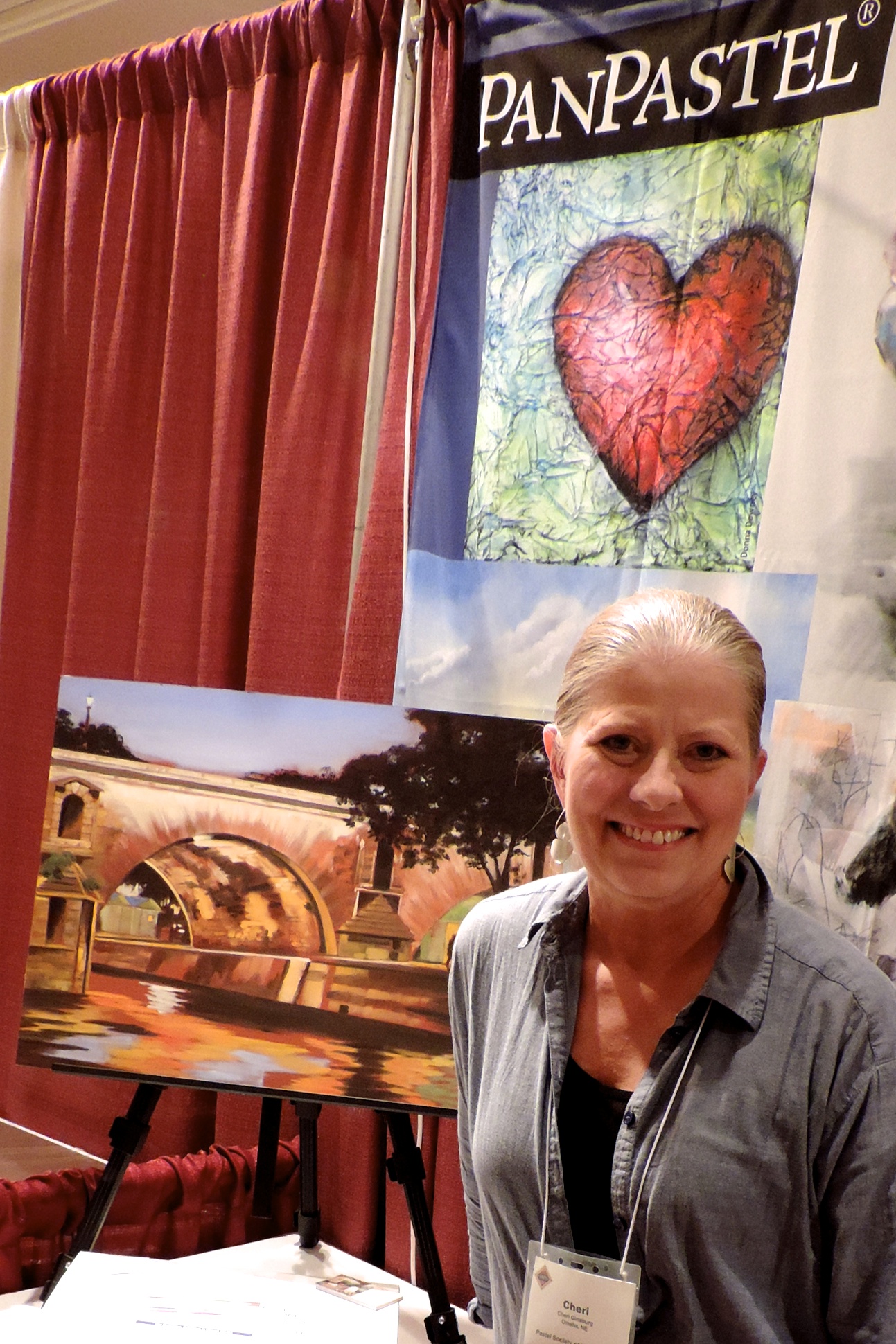 Cheri Ginsburg honored to have "PanPastel®" display her painting "Secret Rendezvous", done entirely in PanPastel®, in their vender booth at the International Association of Pastel Societies (IAPS) Biennial Convention- 2015.