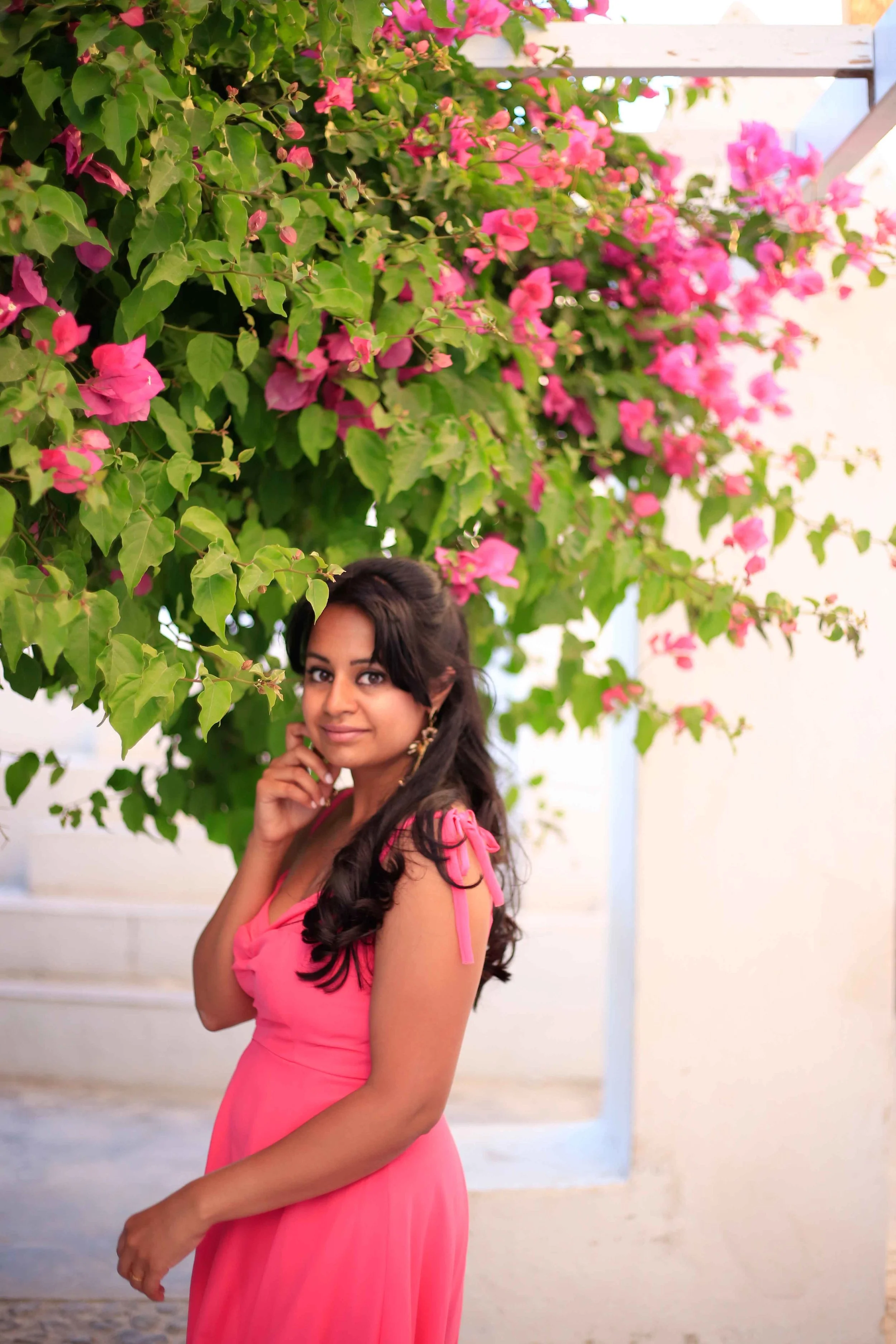 We just passed this little nook on the street and stopped to take a picture. The island is overflowing with striking fuchsia bougainvillea everywhere!