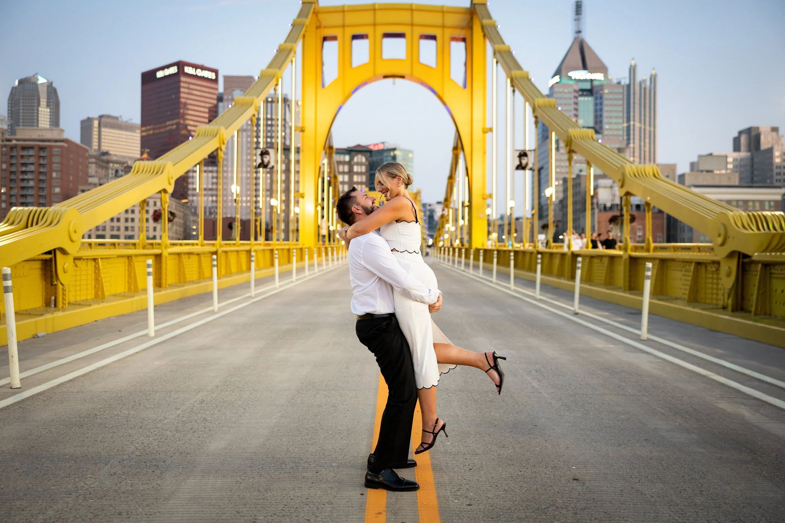 Clemente Bridge Summer Engagement Pictures-58.jpg