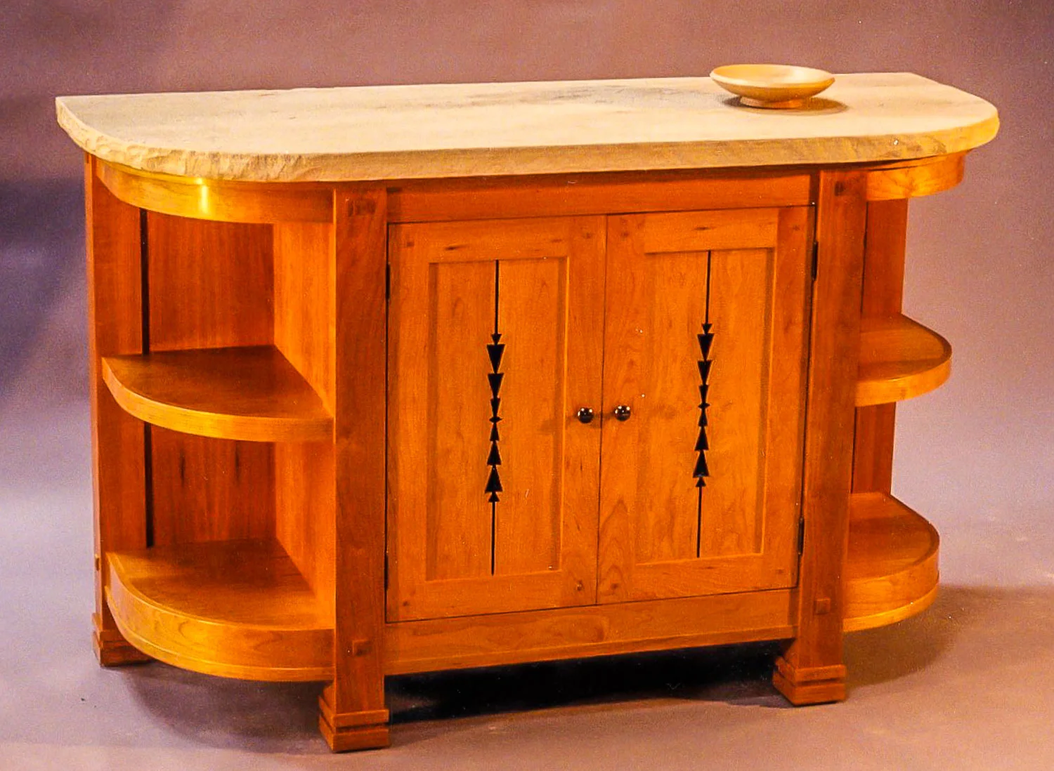 Cherry cabinet with sandstone top