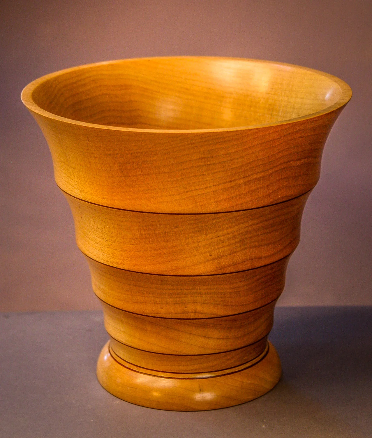 Stacked lamination turned-bowl of maple with mahogany detail. Finest Craftsmanship award, Vail Furniture Show, 1996. 
