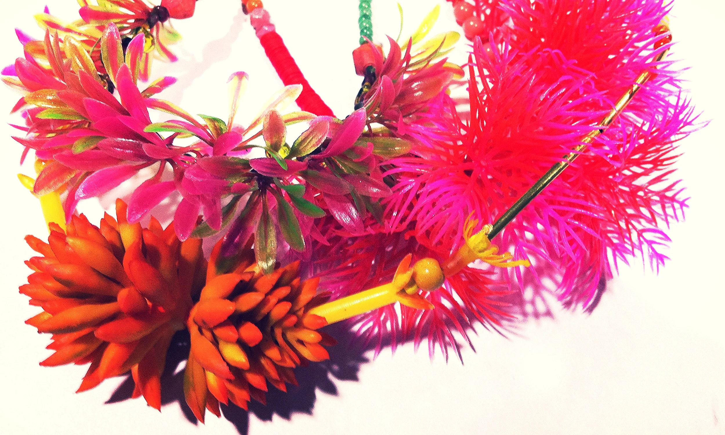   Leaf Litter leis , artificial foliage, semi-precious stones, beads, silver -neckpieces available at various galleries and by commission 