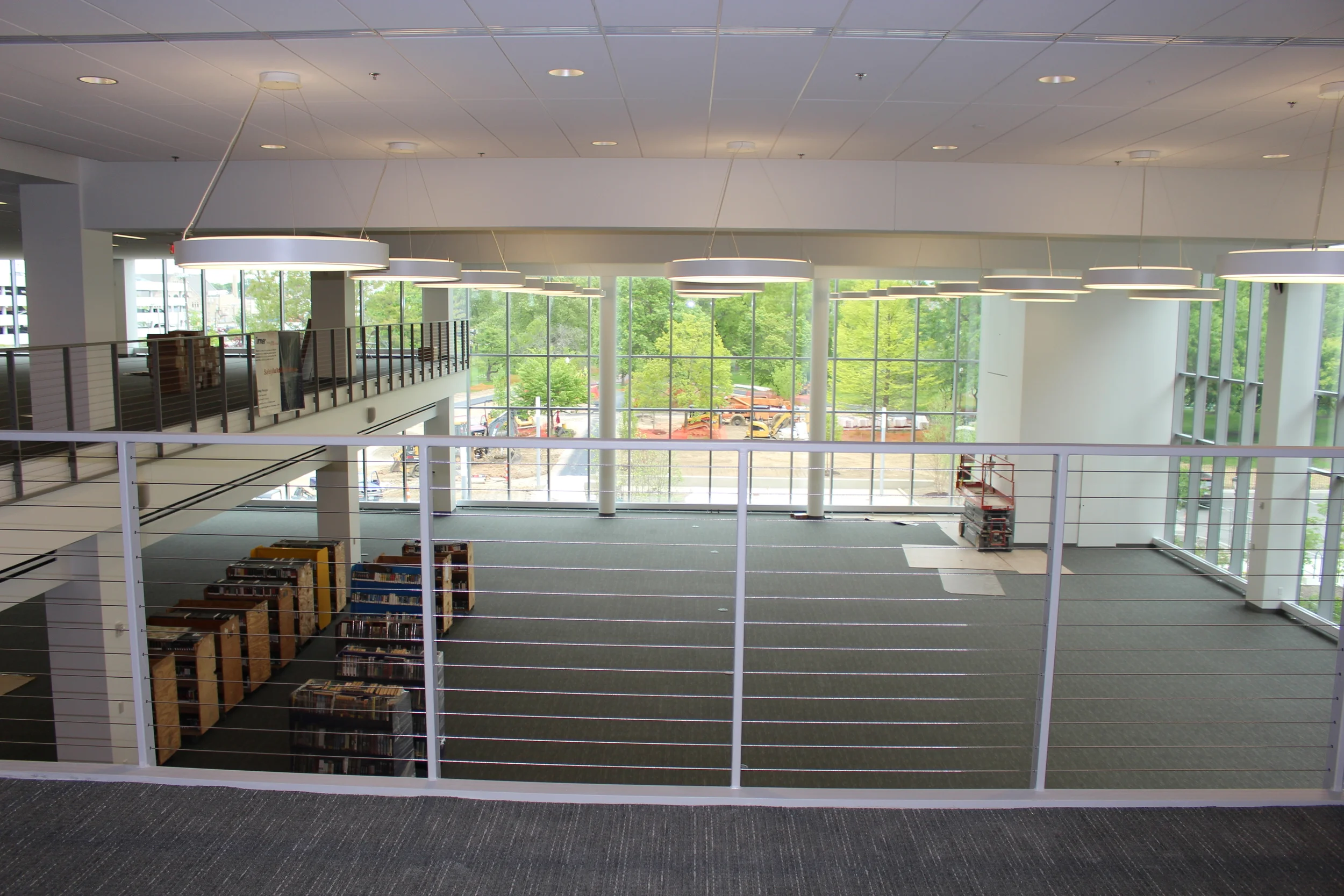 Why is it important for the library to be open and welcoming? It used to be said that libraries should be made of brick so the sun wouldn't damage the books but it seemed to scare people off. The library became an intimidating place and by adding more natural light and an open floor plan the Columbus Library is making great strides in making sure everyone feels welcome. 