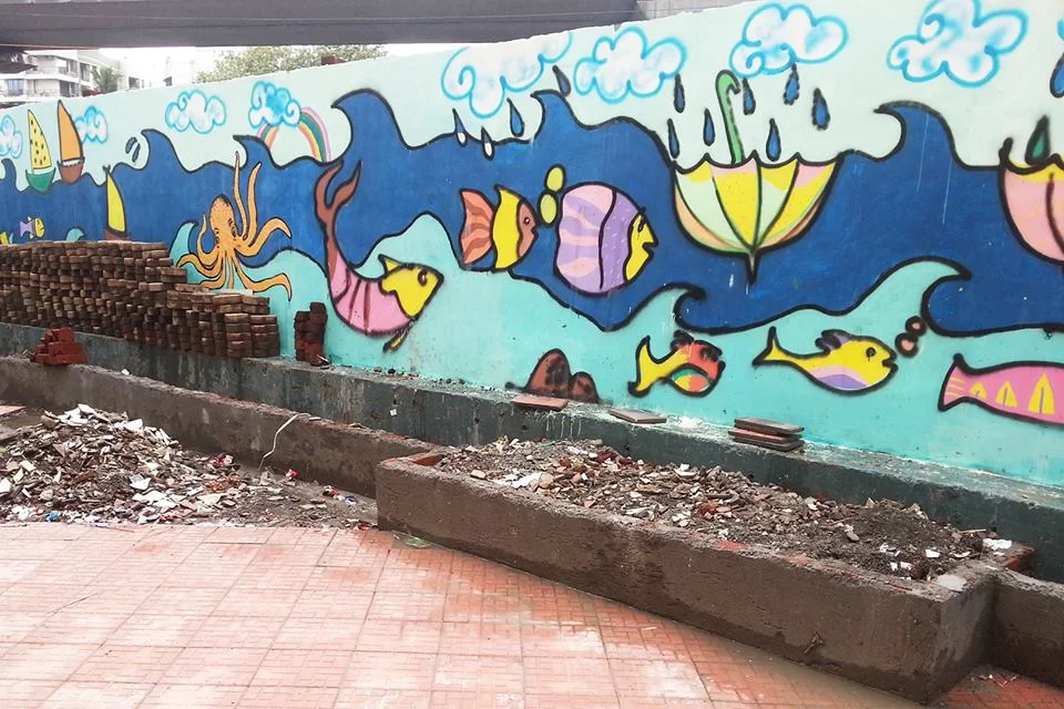 120 feet long mural done by bB together with children from DBS