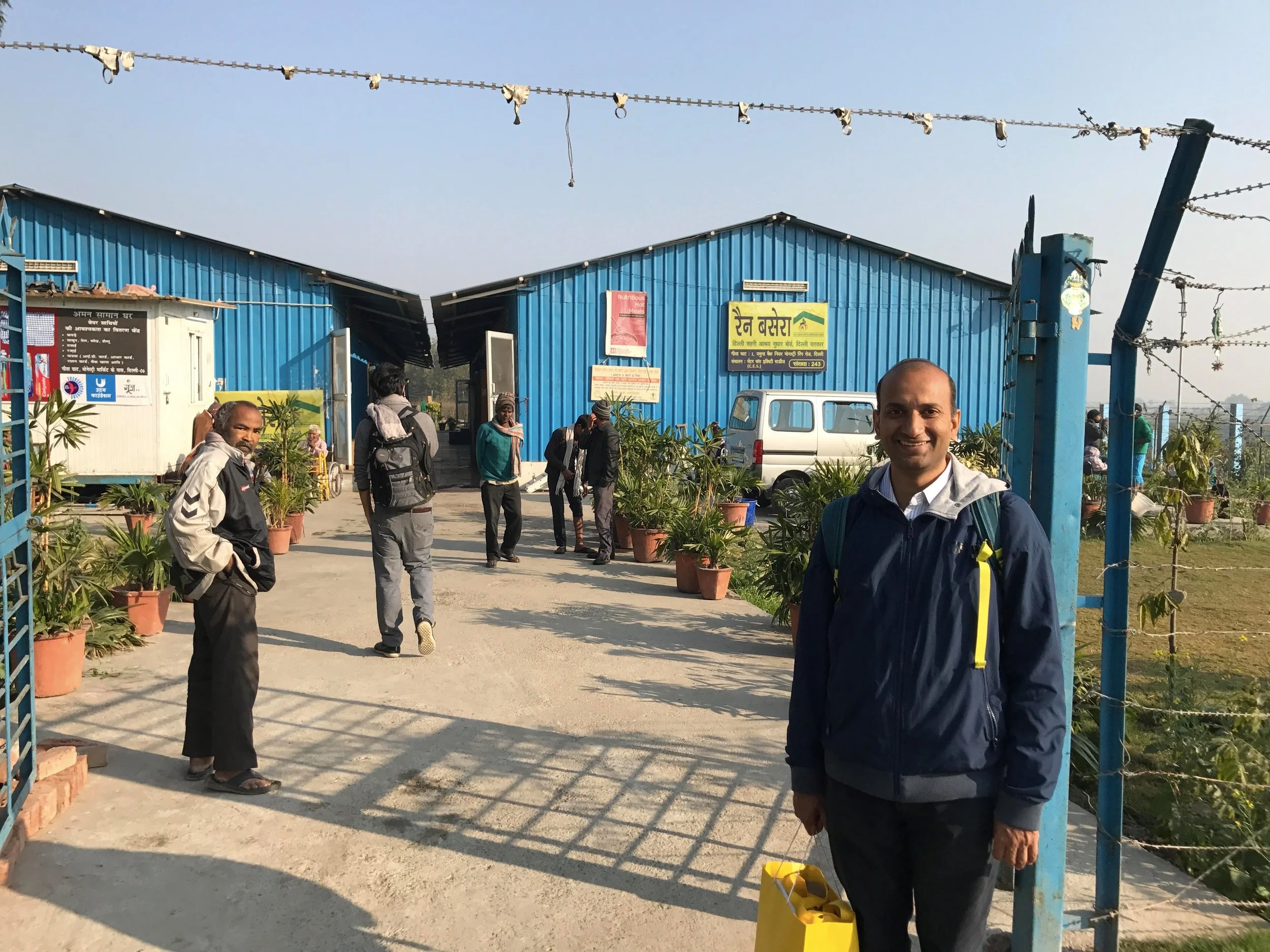 billionBricks Founder & CEO Prasoon Kumar in front of Geeta Ghat Homeless Shelter for Men, managed by Centre For Equity Studies/ Aman Biradiri