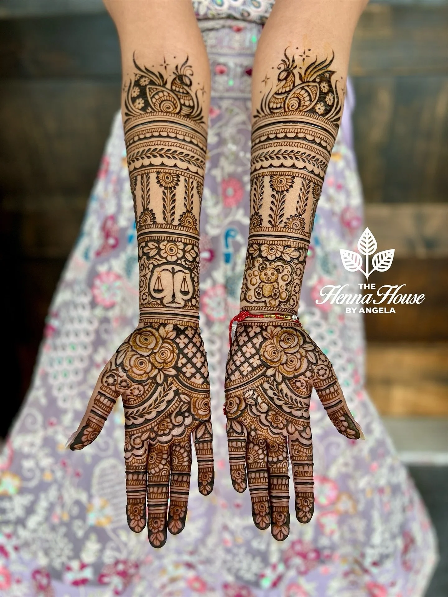N E H A 💜 
Personalized mehndi, including a teddy, bubbles, and the scale of justice.