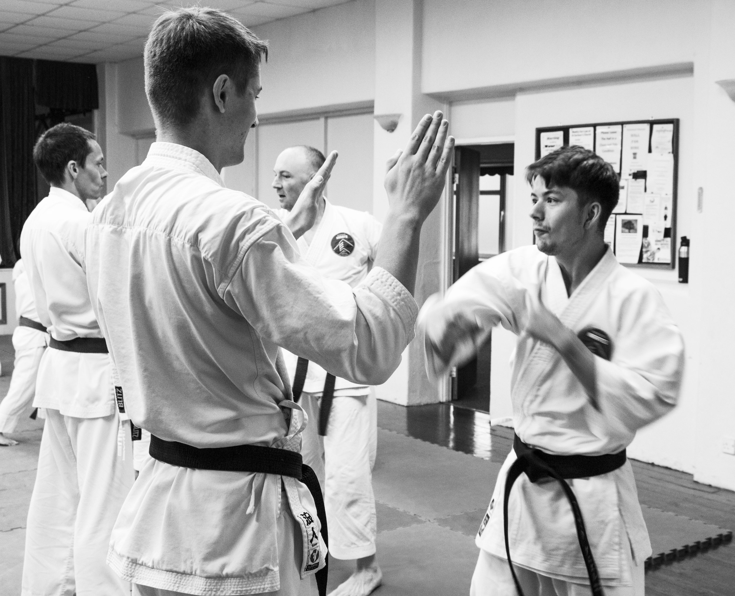 Henry Smith 1st dan and Isaac Daniel 2nd Dan practicing a training drill.