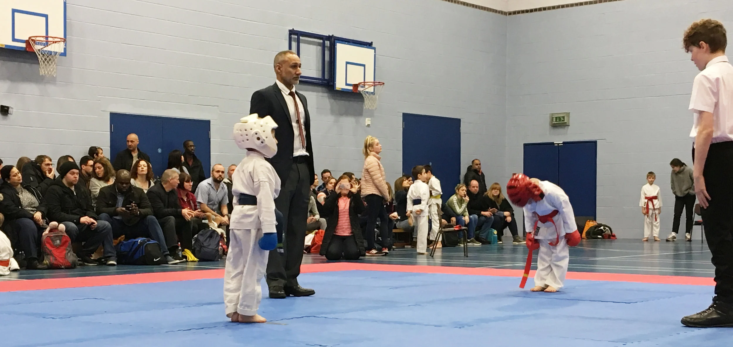 SKB Chief Instructor David Judah Daniel 4th Dan judging at a competition in 2018