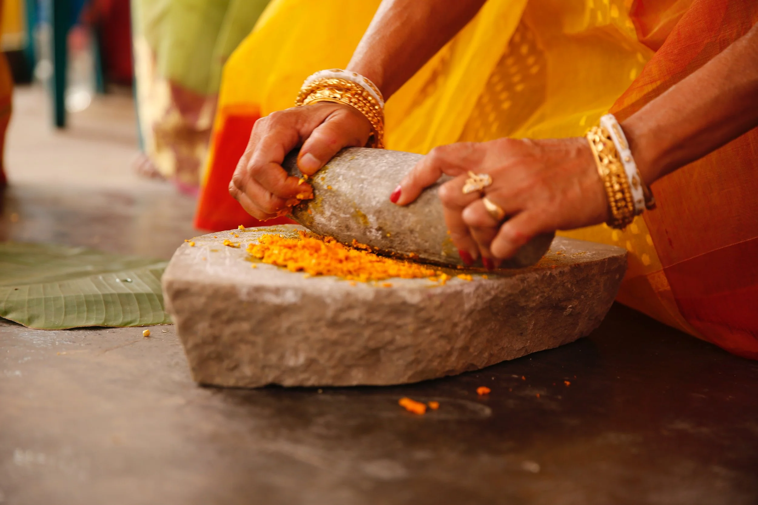 traditional Sri Lankan turmeric grinding