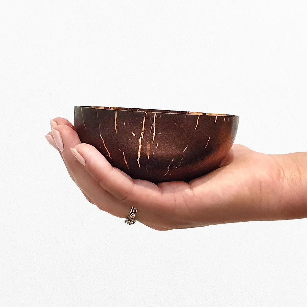 coconut bowl held in hand