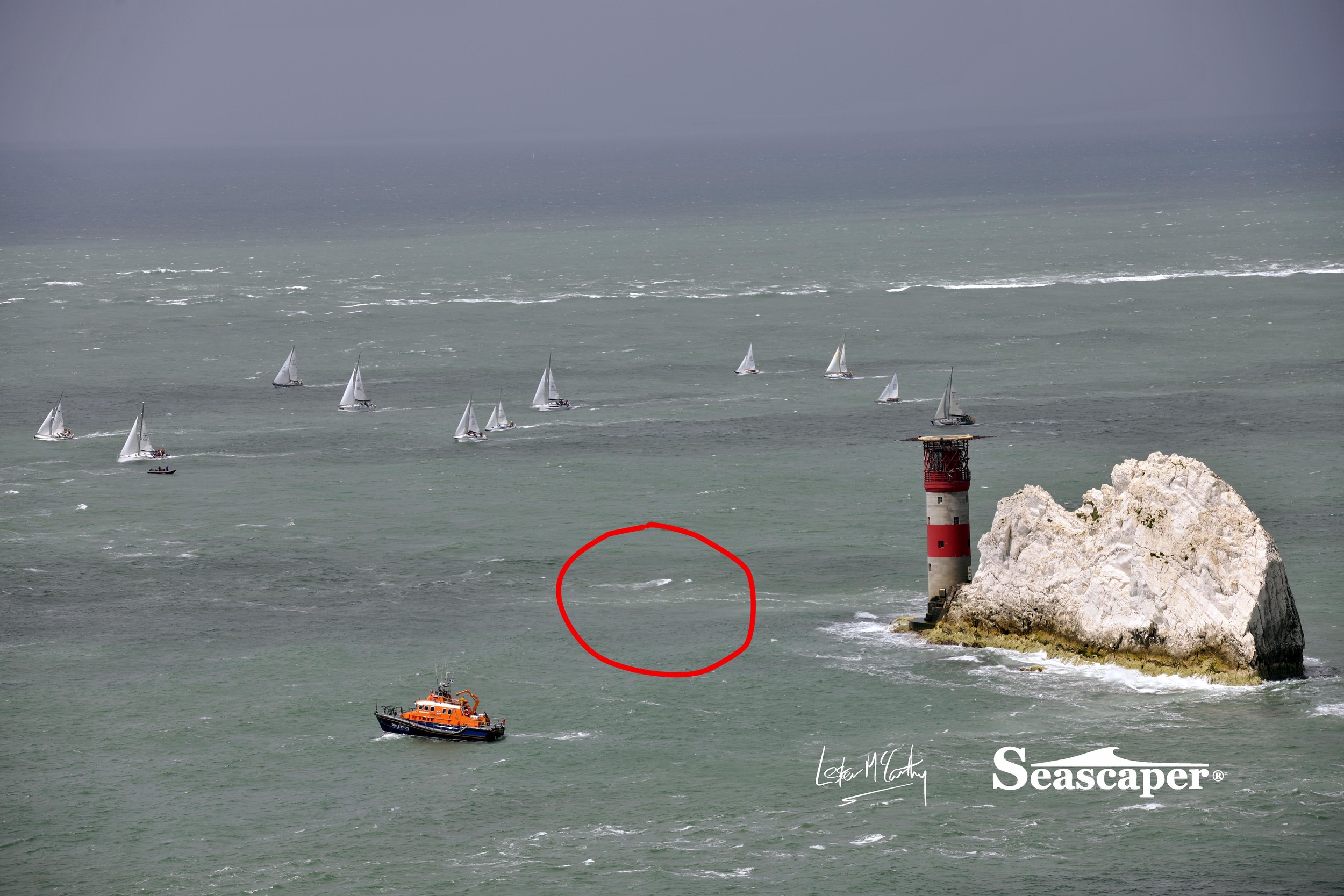 At low water yachts have to take a longer course around the Island, the wreck is in the position marked.