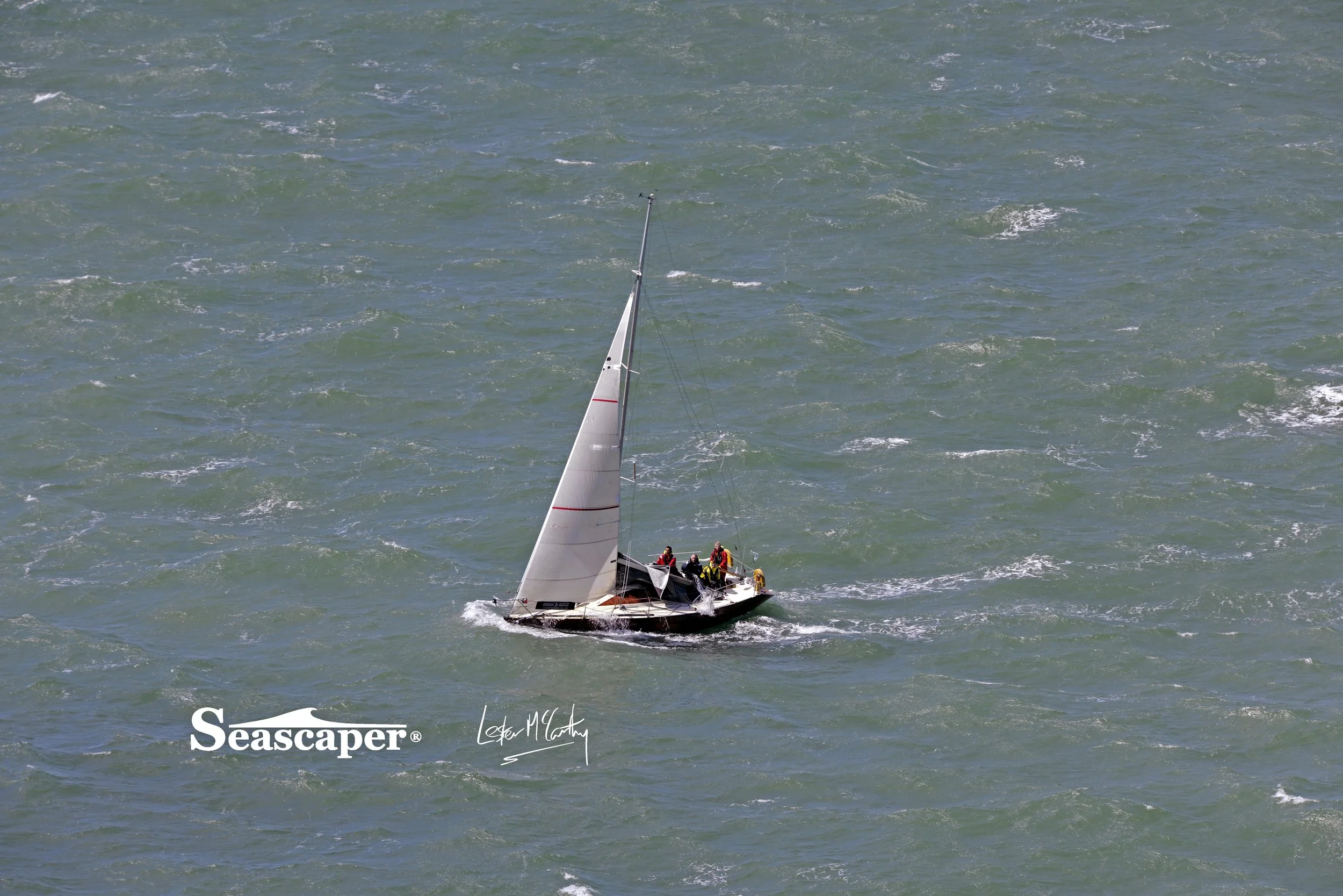 Within minutes the yacht was low at the bow as water came in, the mainsail was lowered and bailing out began.