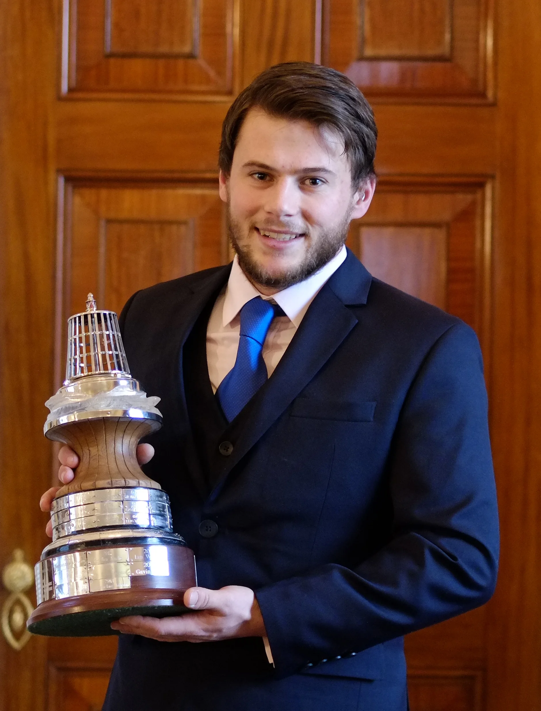 Gavin with his name engraved on the trophy alongside Sir Francis Chichester, Sir Ben Ainslie, Dame Ellen MacArthur, Sir Robin Knox Johnston, Sir Chay Blyth, Sir Edward Heath and David Cowper amongst other notable yachtsmen.