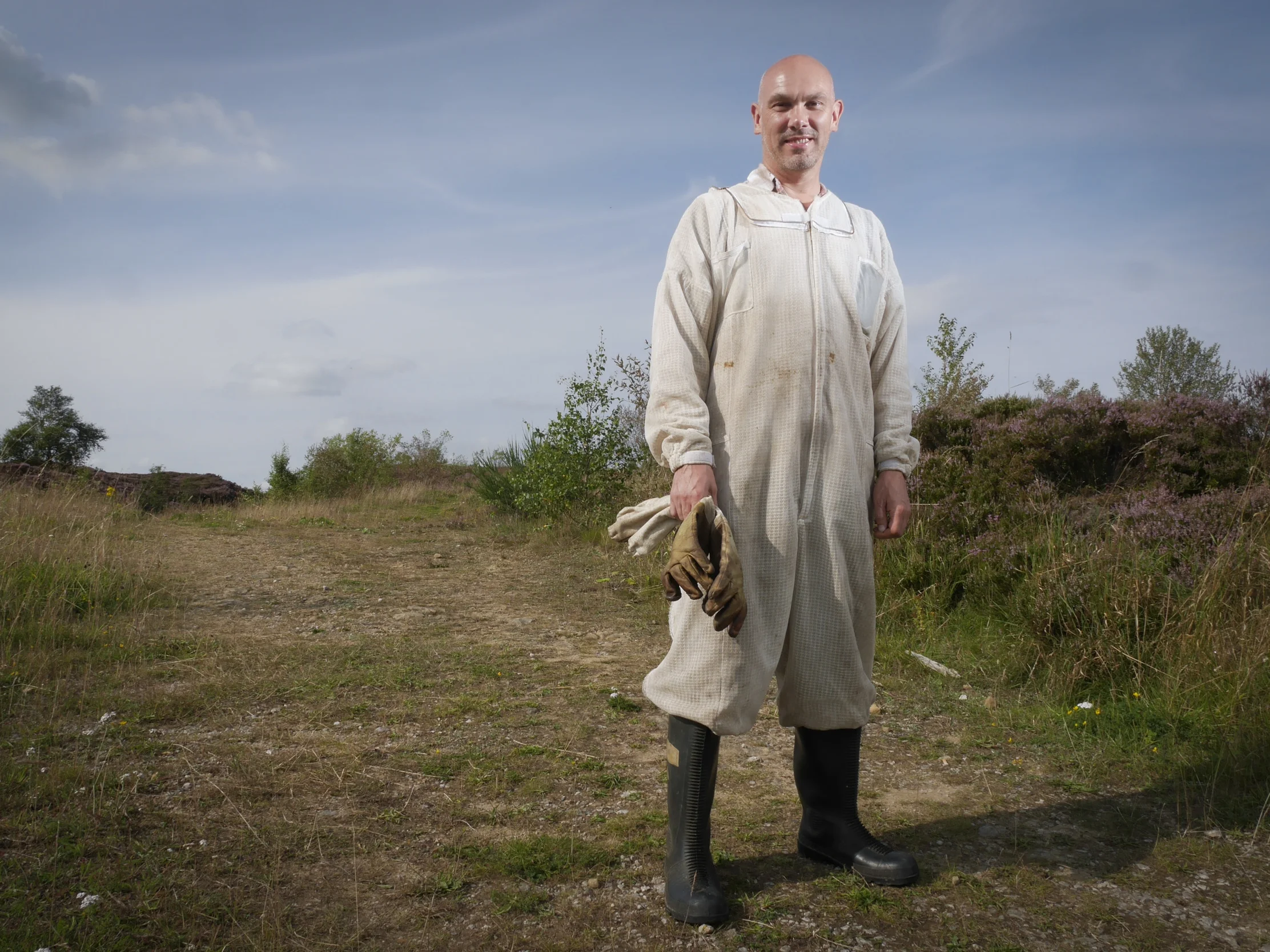 Beekeeper Simon Russ near Matlock, Derbyshire, 7/8 2014