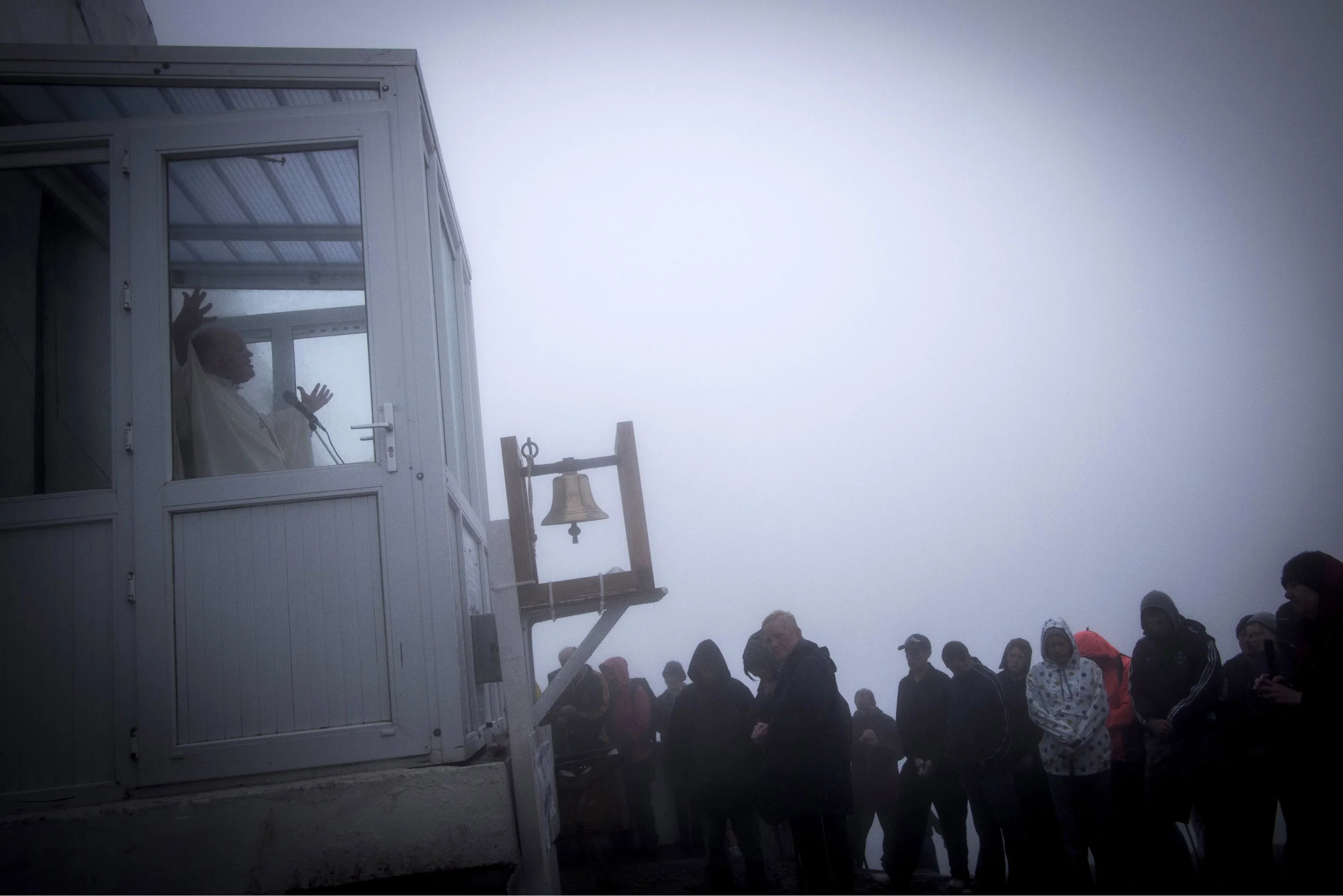 Reek Sunday pilgrims attend mass on the peak of Croagh Patrick, Westport, Ireland, 31/7 2011
