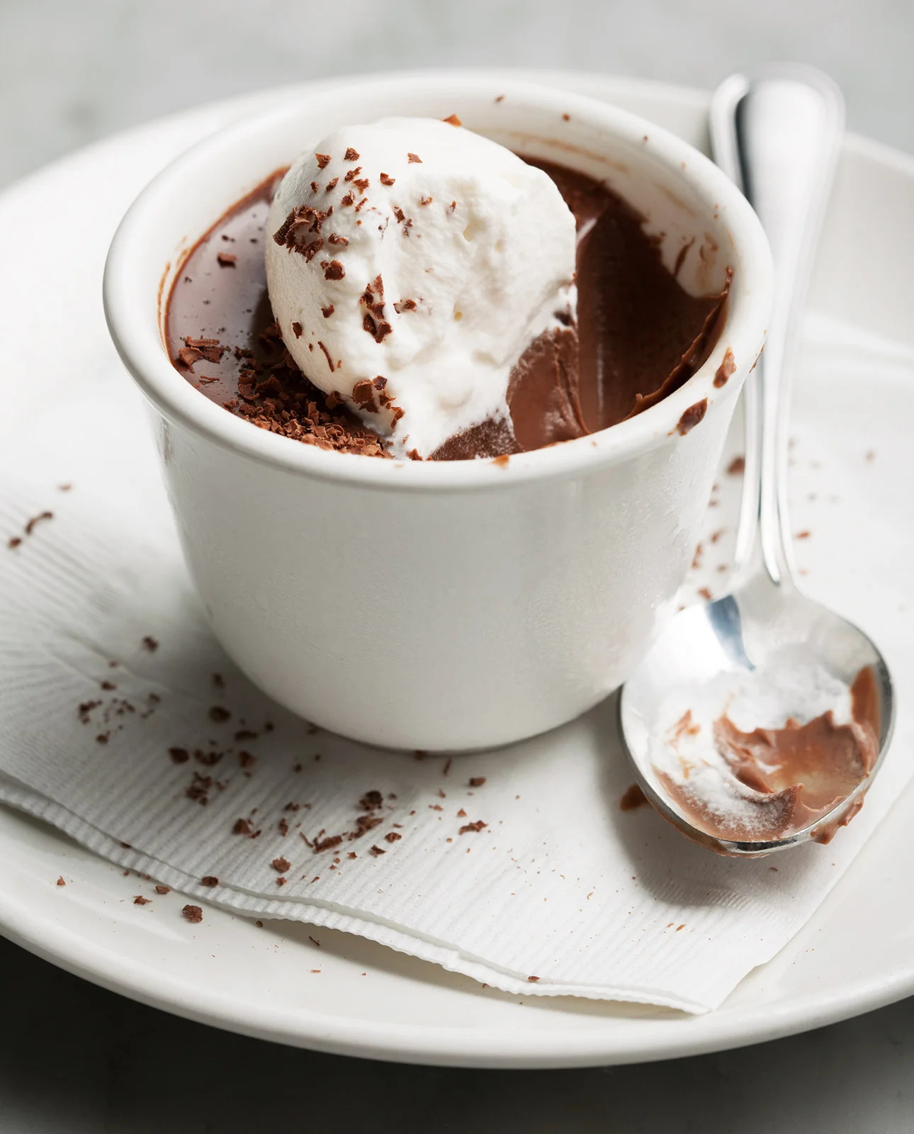 single serving of chocolate pudding with whipped cream