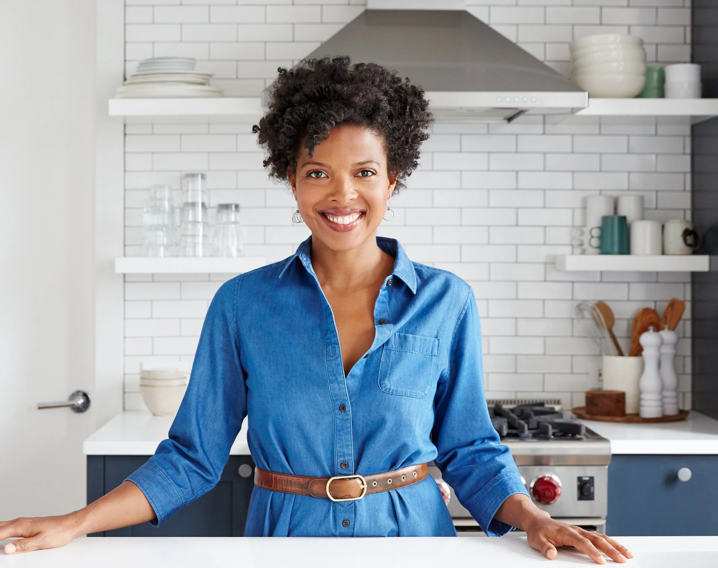 Woman in denim dress in Kitchen