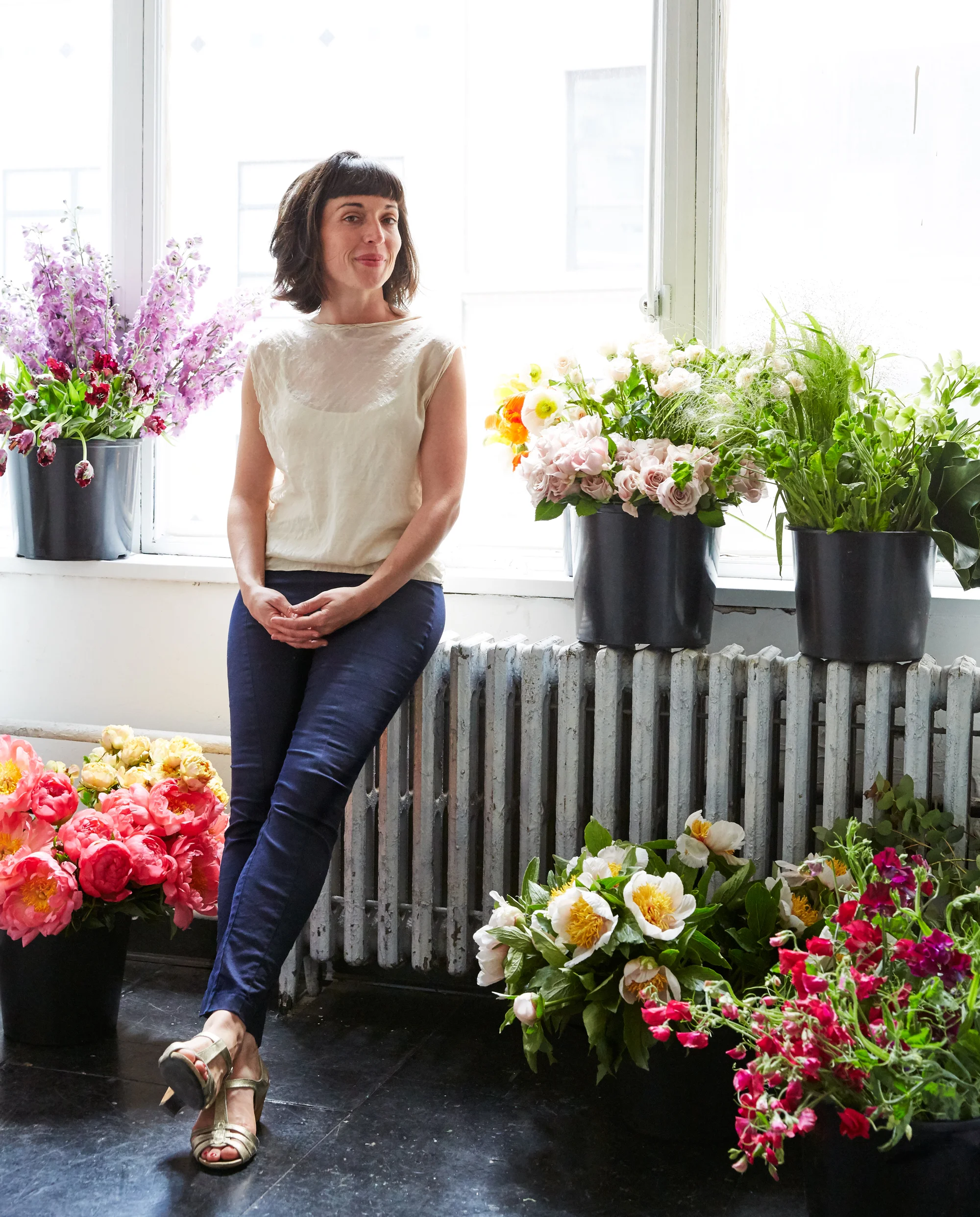 Woman at Window with flowers