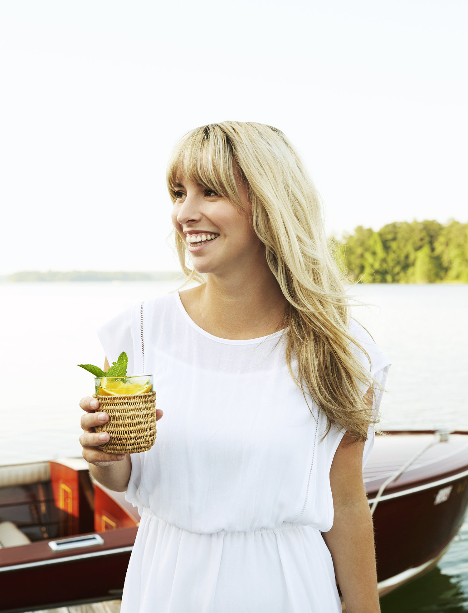 Blonde woman with cocktail