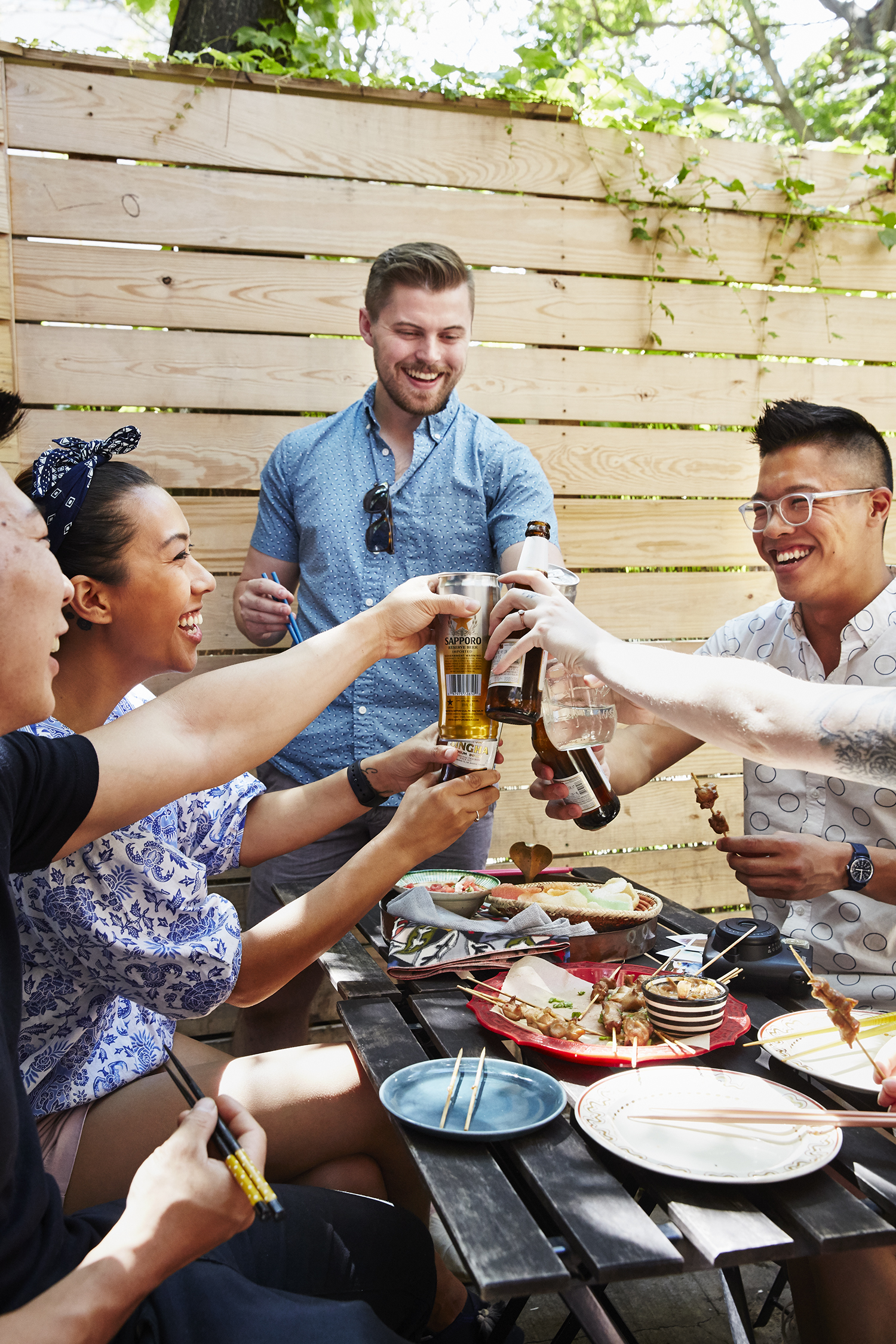 Friends sharing a meal on an outdoor patio
