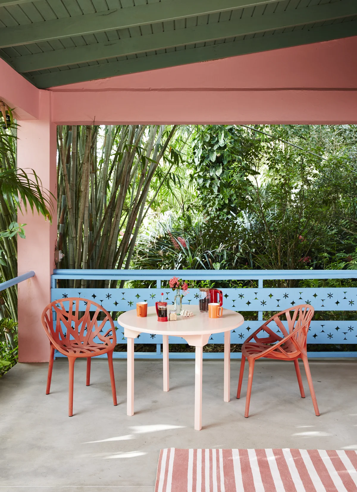 Pink outdoor dining table with coffee in the Caribbean