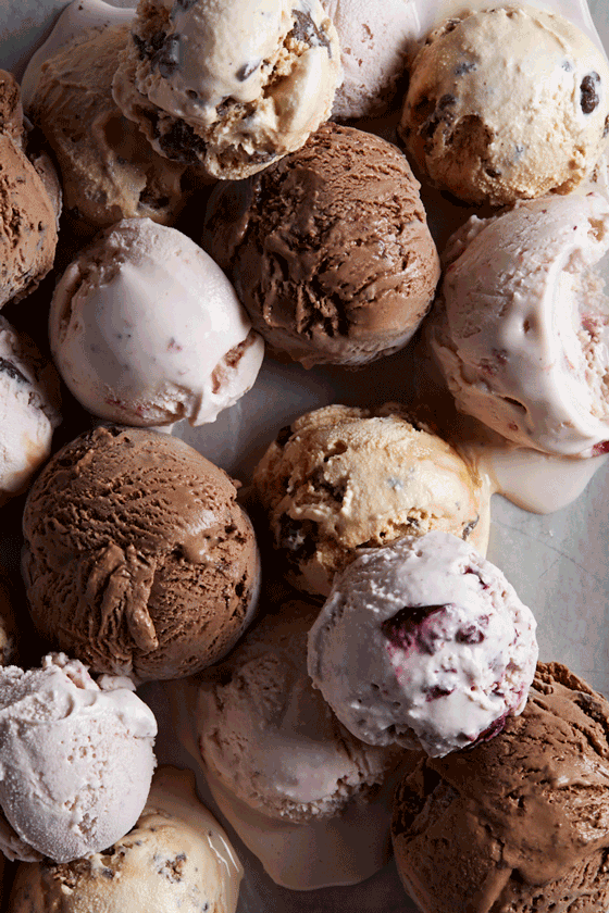 GIF of scoops of ice cream being take off metal sheet
