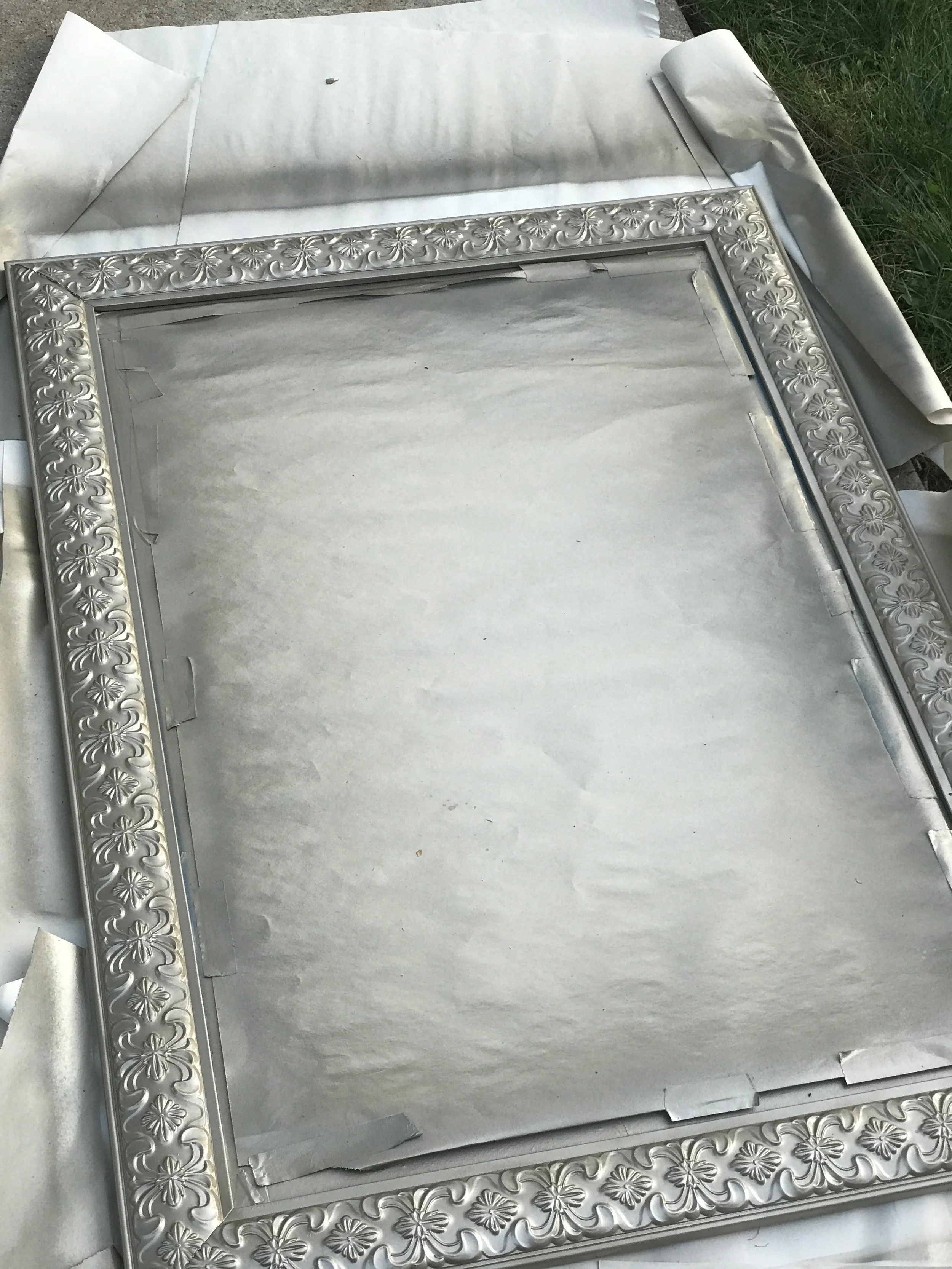 Then go ahead and spray the frame evenly. I'd do 2 coats unless you have time for a third. Make SURE to get the inner frame right by the tape because this area will be noticed if you don't have decent coverage there. LET THE FRAME SIT FOR 4-5 HOURS IF UNABLE TO LET SIT OVERNIGHT. Even after 4-5 hours you risk a SLIGHT indentation of your fingerprints on the sides. So much work, I wouldn't risk it.