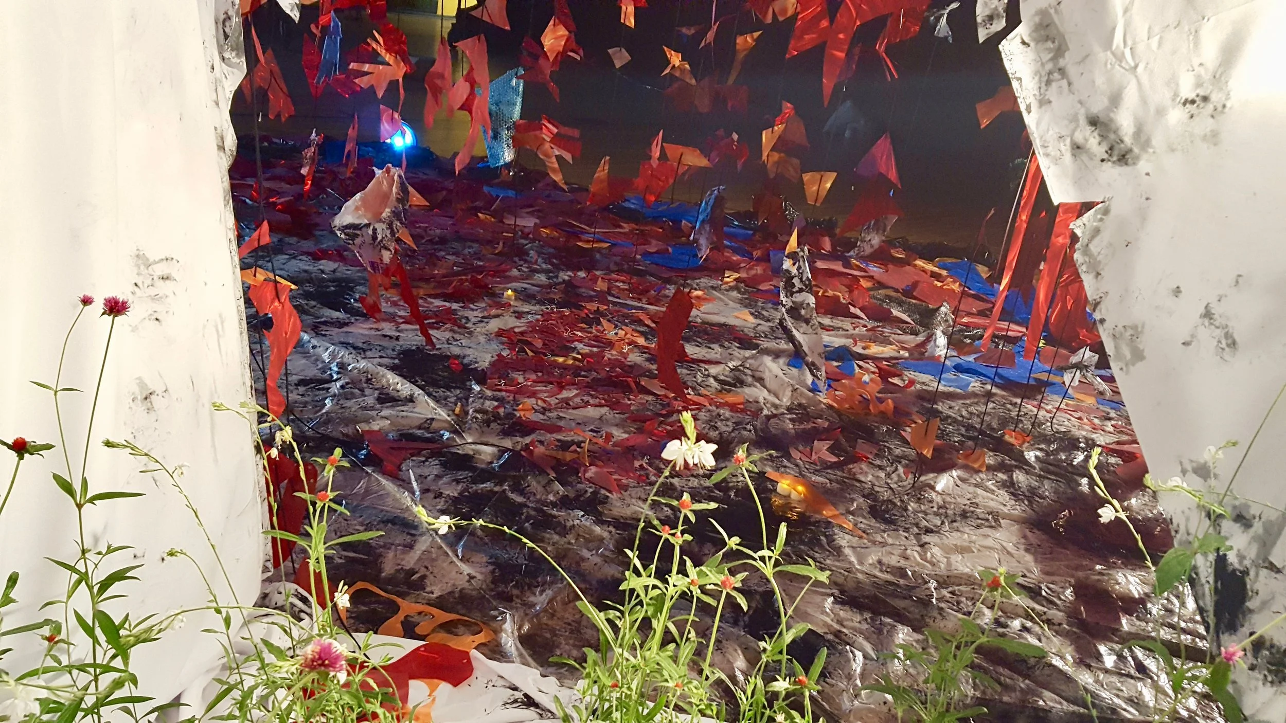 Anthropocene, 2017, Polycarbonate Film, Parachute Cord, Plastic, Acrylic, Fabric and Live Plant Material, 17' High x 20' Wide x 20' Long. Back Detail .