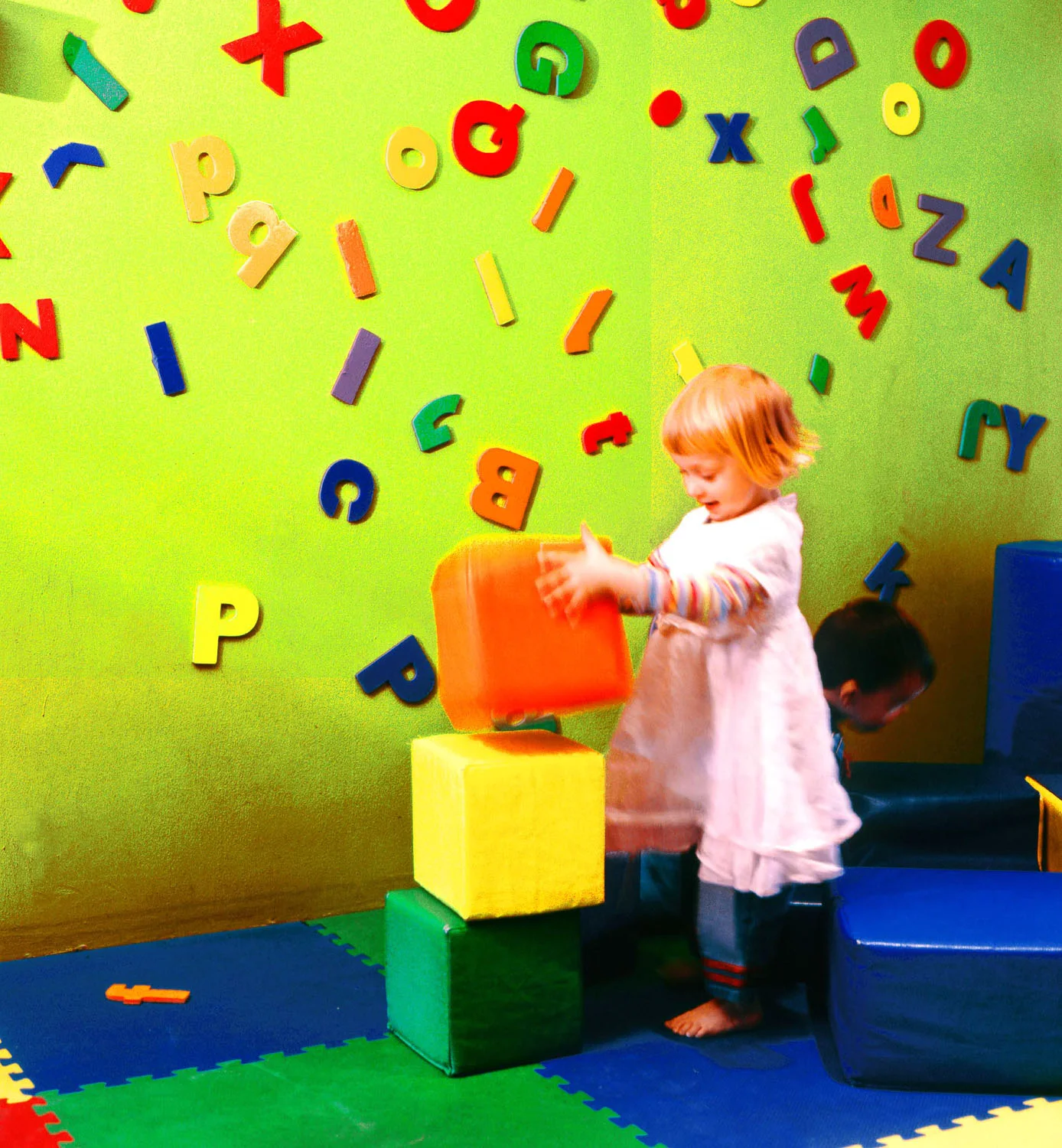 girl at magnet wall copy.jpg