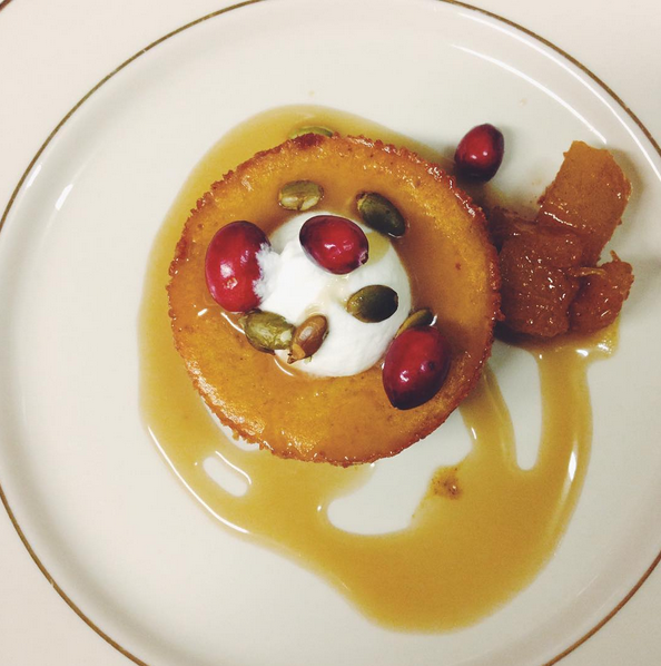 pumpkin cheesecake with sauteed pumpkin and a caramel drizzle