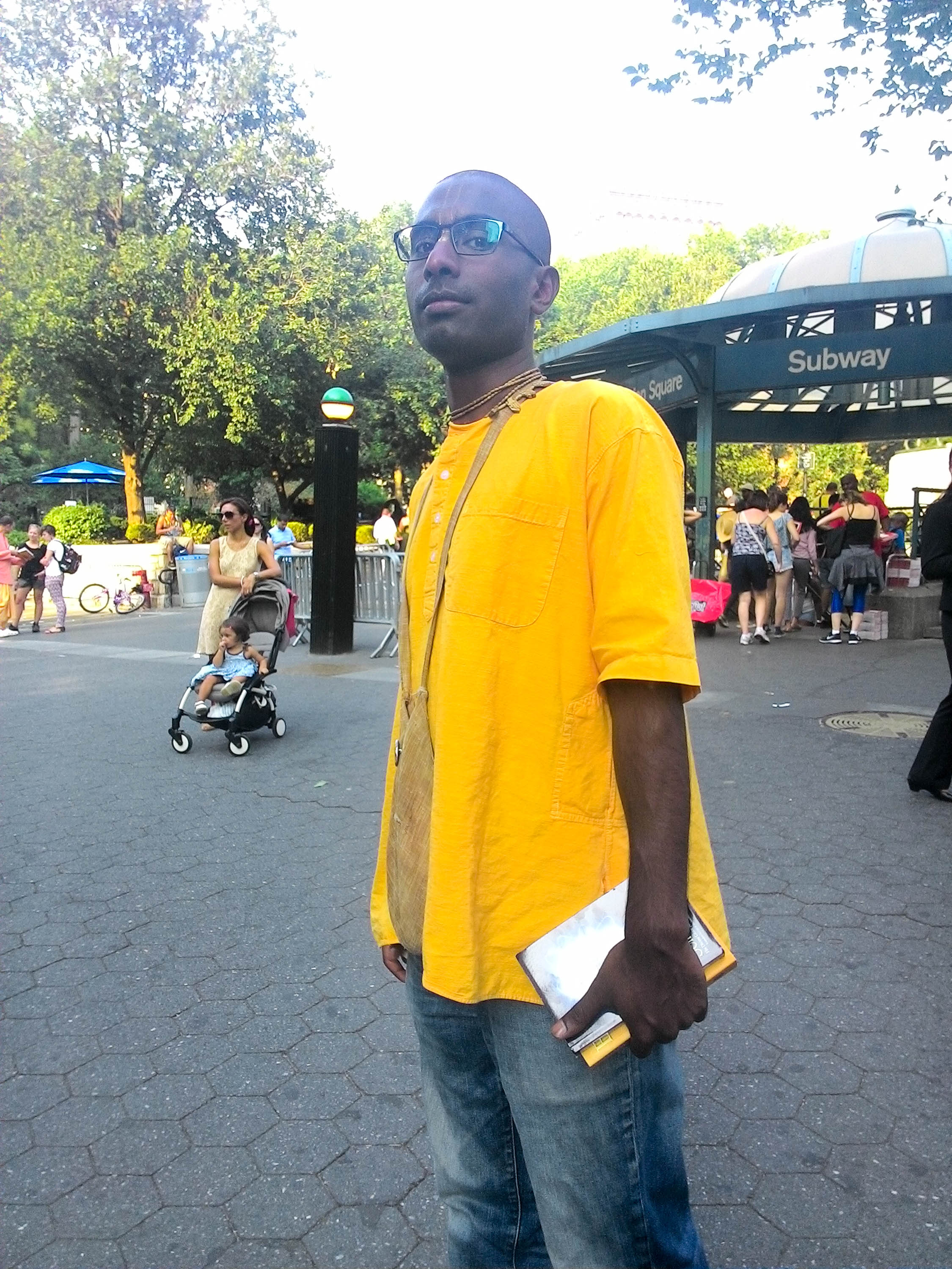 Nihal arrives in Union Square after his first day of classes as a college junior. He wears “semi-prayer” clothes to college