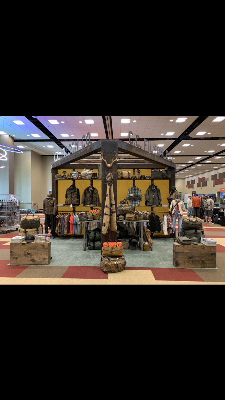 CC Filson Wholesale booth and sign.PNG