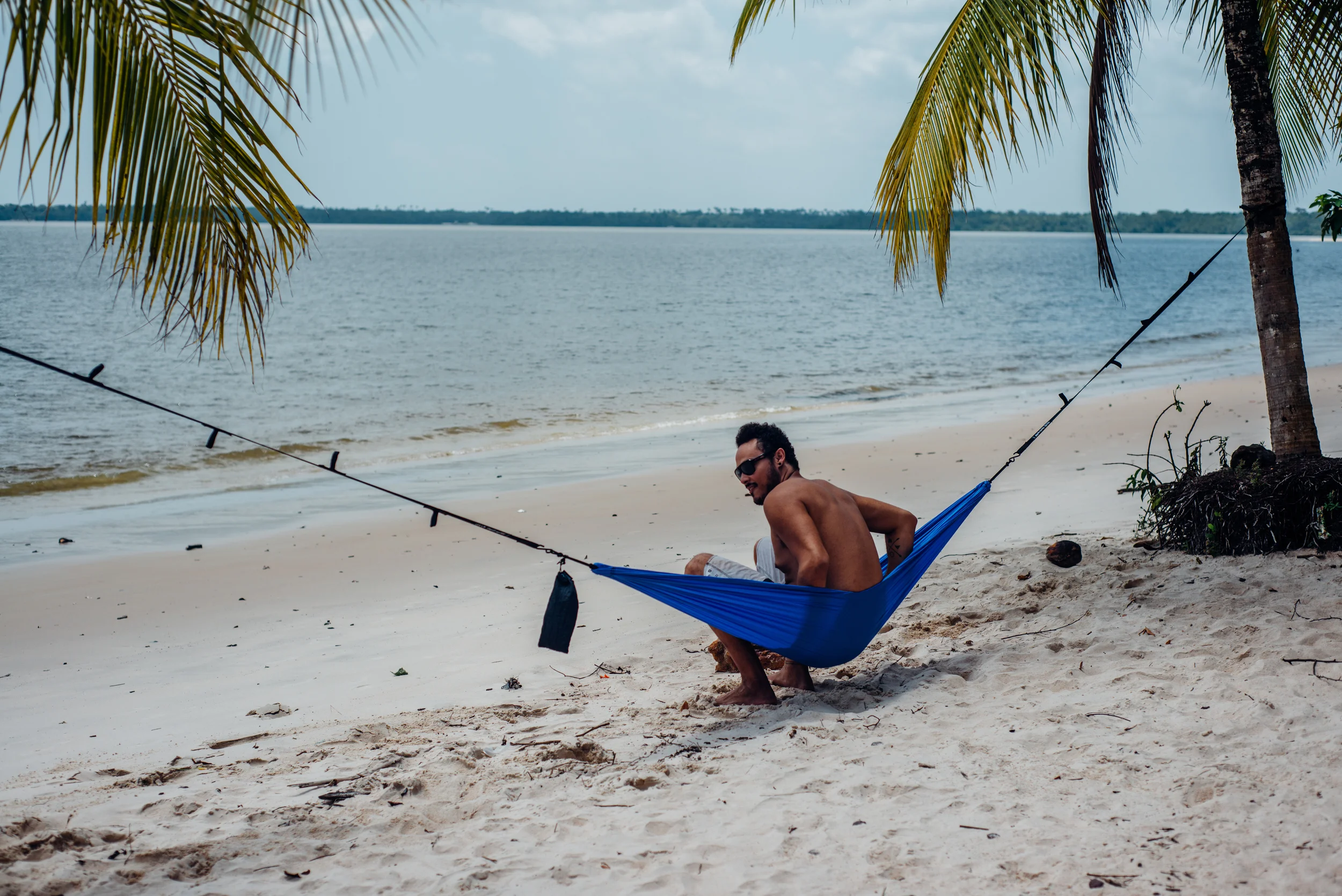 Igor testing the hammock for me. Let's just say I was almost hitting the bottom haha! It may not be a beach in hawai’i but I’ll take it! 