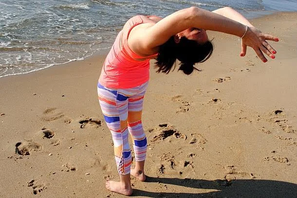Amanda Feinstein of Younique Yoga will teach a Sunday morning beach yoga class.