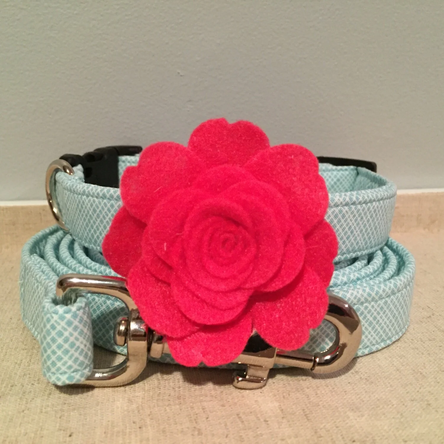 Spoiled Paws Bowtique features handmade detachable flowers and collars.