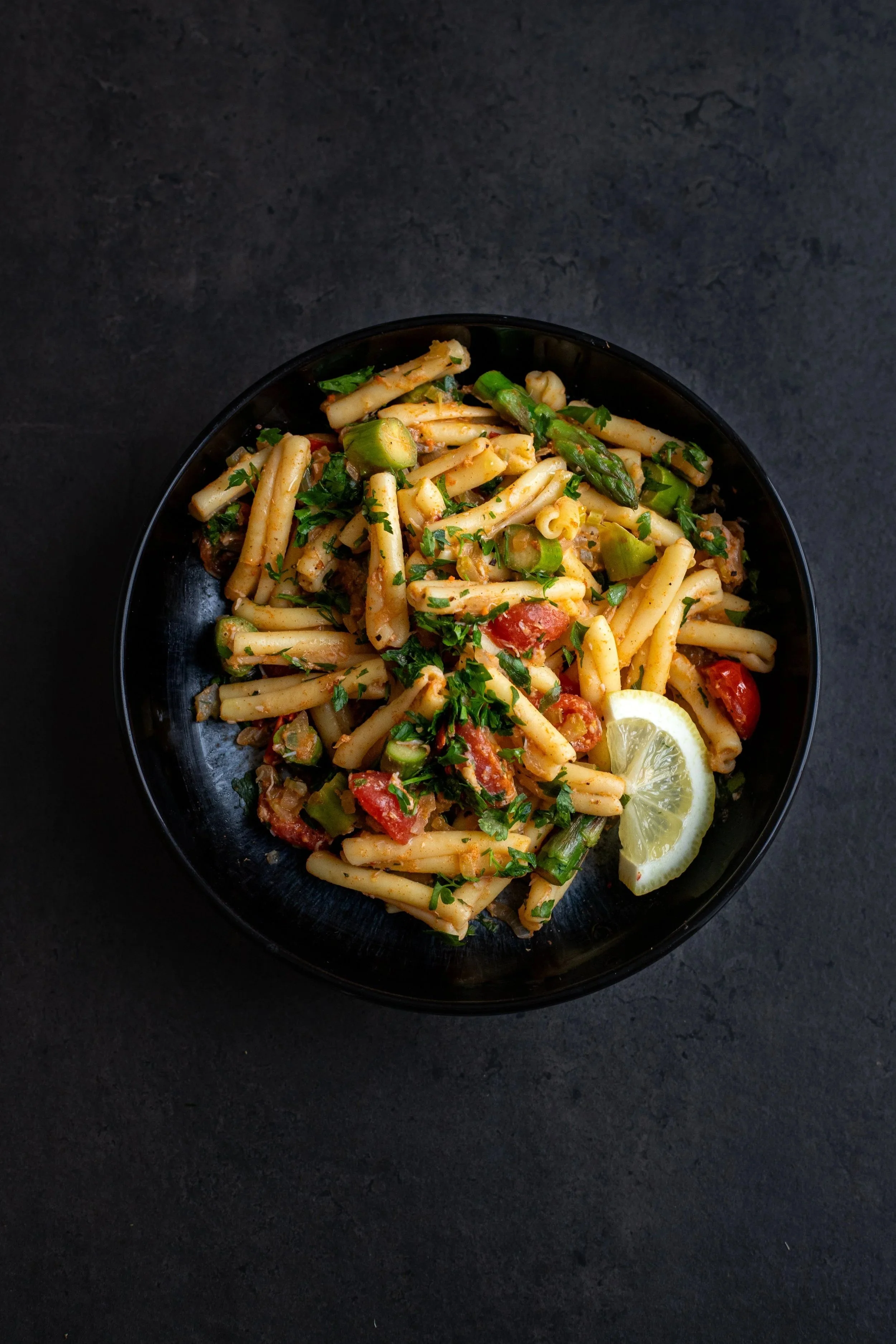 A bowl of crab and asparagus pasta