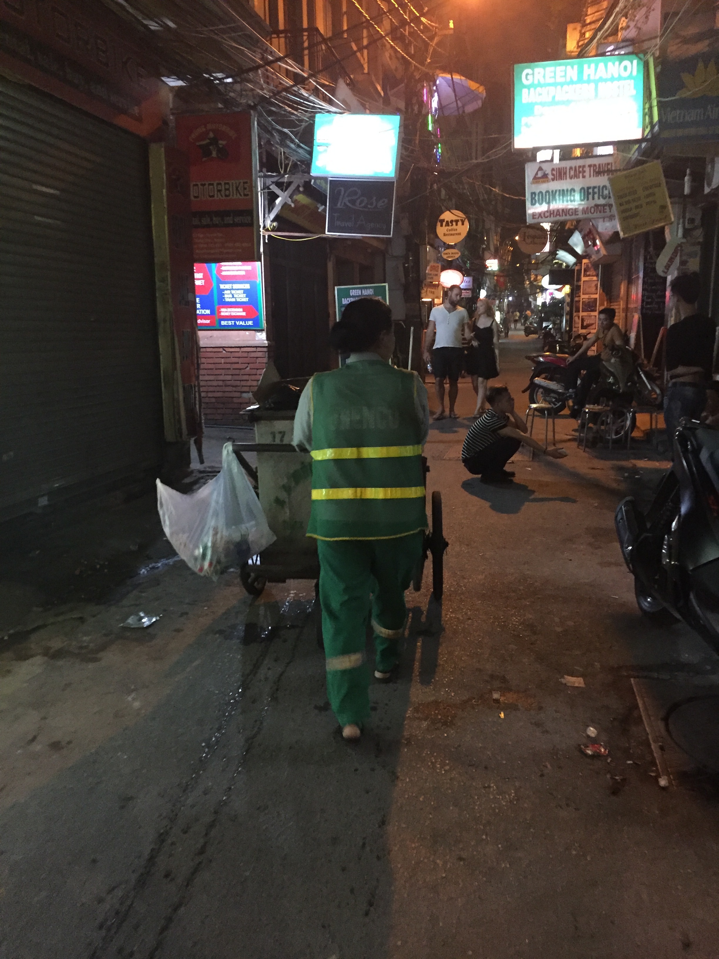 A Garbage Collector Making Her Nightly Rounds