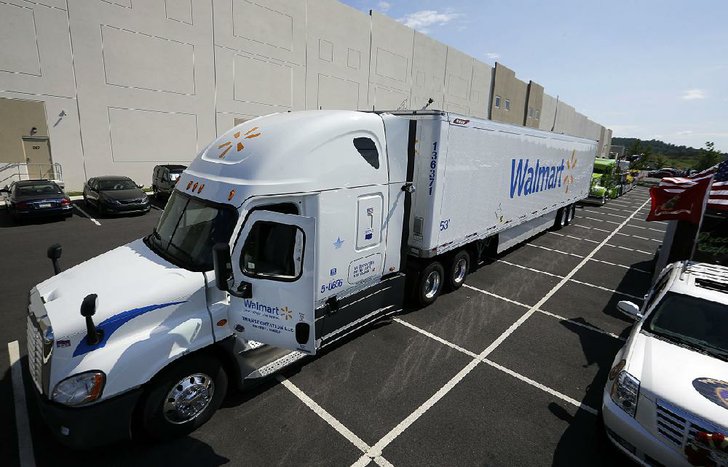 Photo by MEL EVANS / AP A Wal-Mart truck is parked in front of a distribution center last year in Bethlehem, Pa. Wal-Mart is testing the use of cameras inside some of its commercial vehicles.