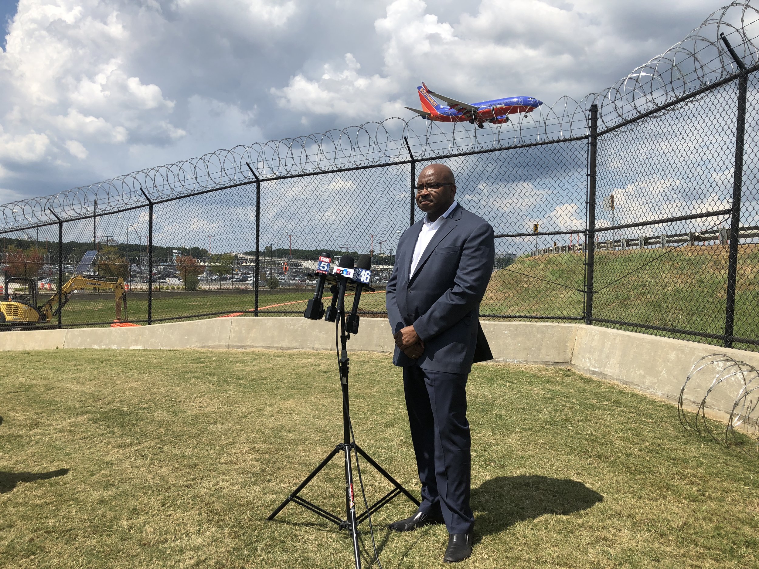 Hartsfield-Jackson Airport had a press conference to point out the razor wire it added to the top of its fence. Two people have breached the fence this summer.